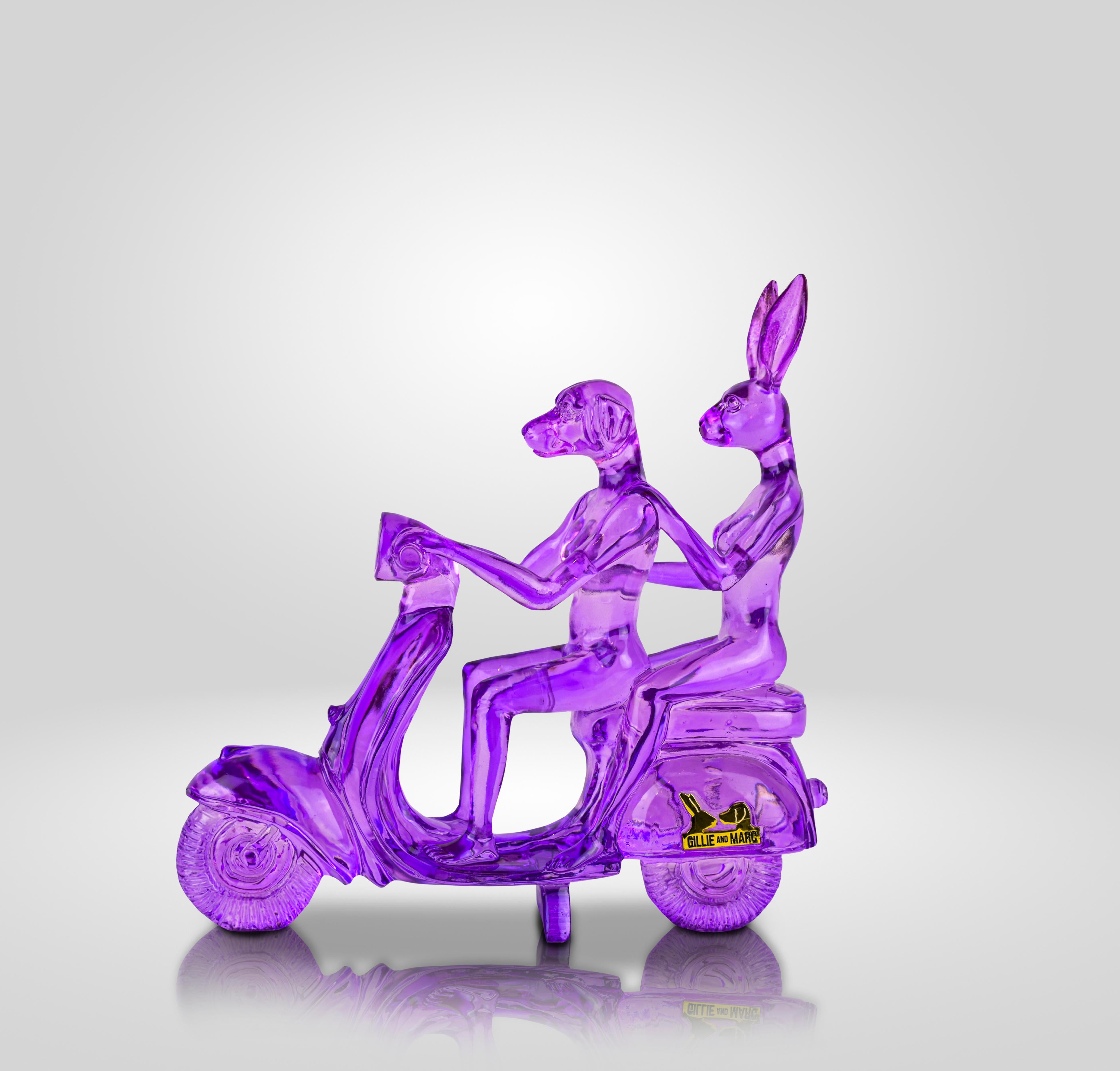Title: Lolly mini vespa riders (Clear Resin Sculpture) in Purple
Authentic resin sculpture
Open Edition

Description
This stunning miniature sculpture is modelled off one of Gillie and Marc’s most iconic pieces of work, featuring Dogman and