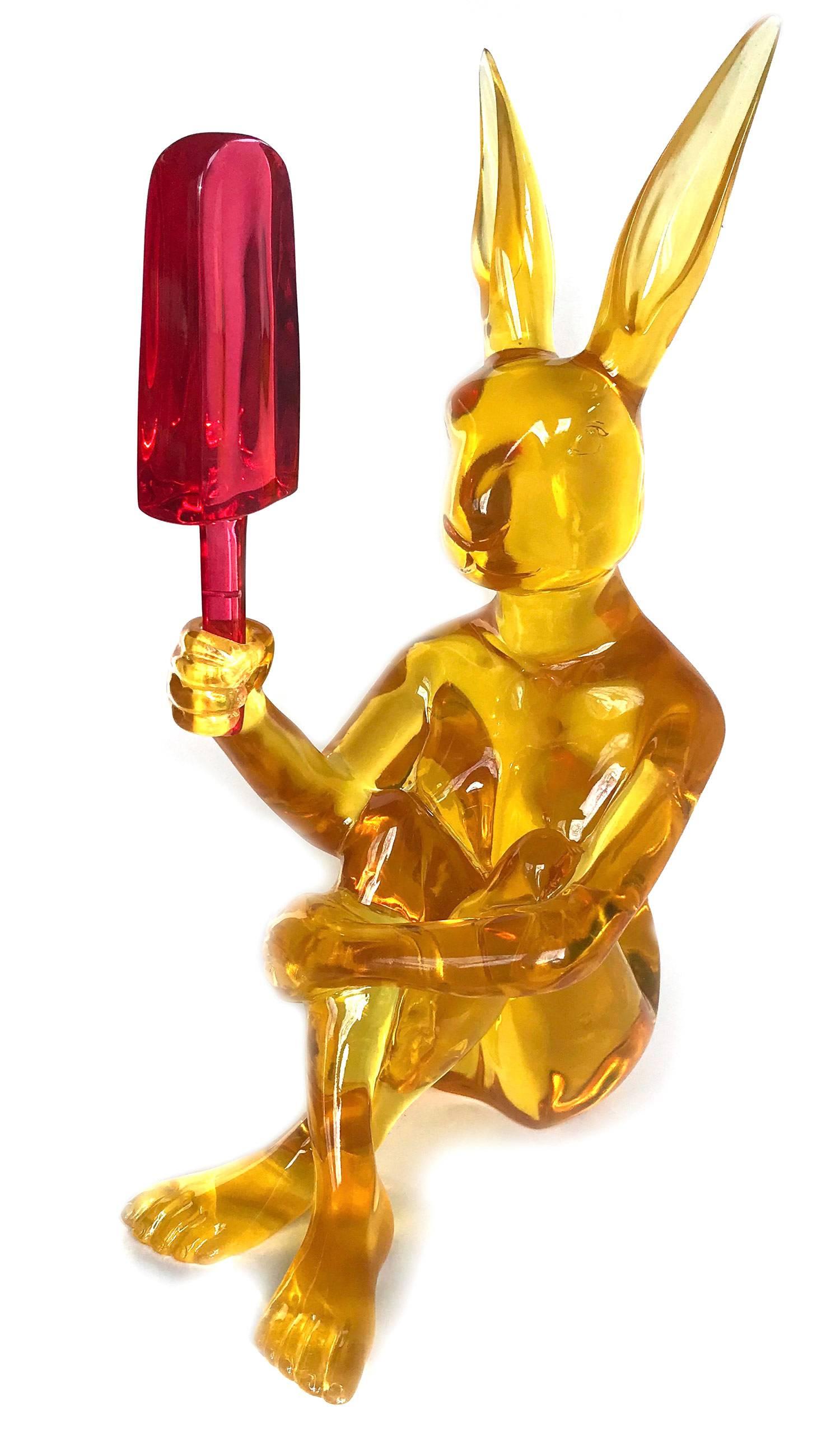 A whimsical yet very strong piece depicting the Rabbit from Gillie and Marc's iconic figures of the Dog/Bunny Human Hybrid, which has picked up much esteem across the globe. Here we find Rabbit holding an ice cream from the Lolly Collection, or