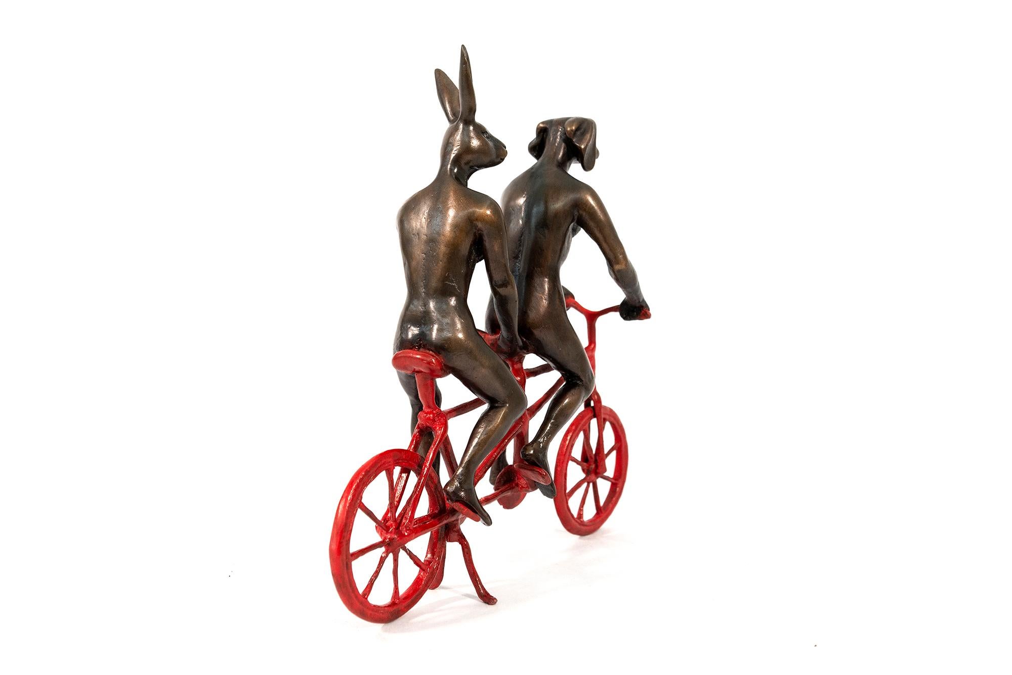 Australia’s Gillie and Marc, the contemporary artist duo, continue to create their popular, humorous dogman, rabbit-woman hybrid imagery in this new bronze sculpture. The playful human/animal figures represent the spiritual connection between
