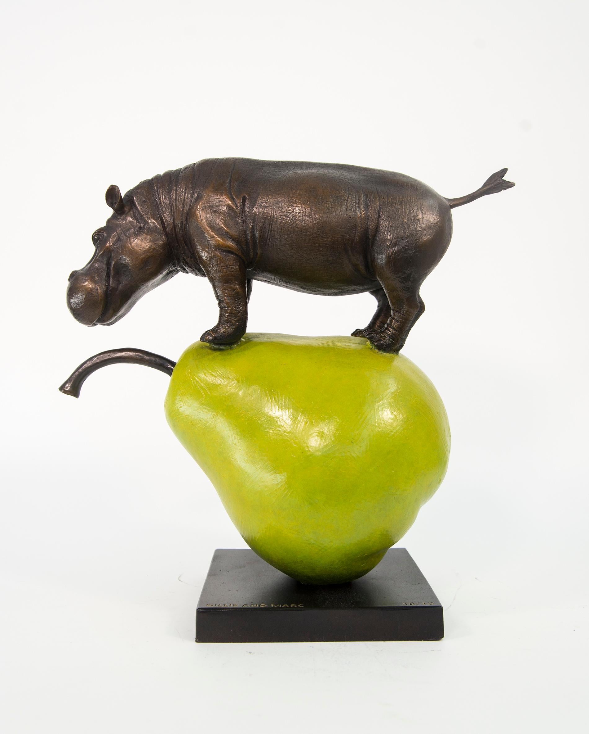 A bronze hippo sits atop a green pear in this playful tabletop sculpture by Australia’s artistic duo, Gillie and Marc. In various cultures, the pear represents fertility, wisdom and health. The couple are known for their humorous sculptures,