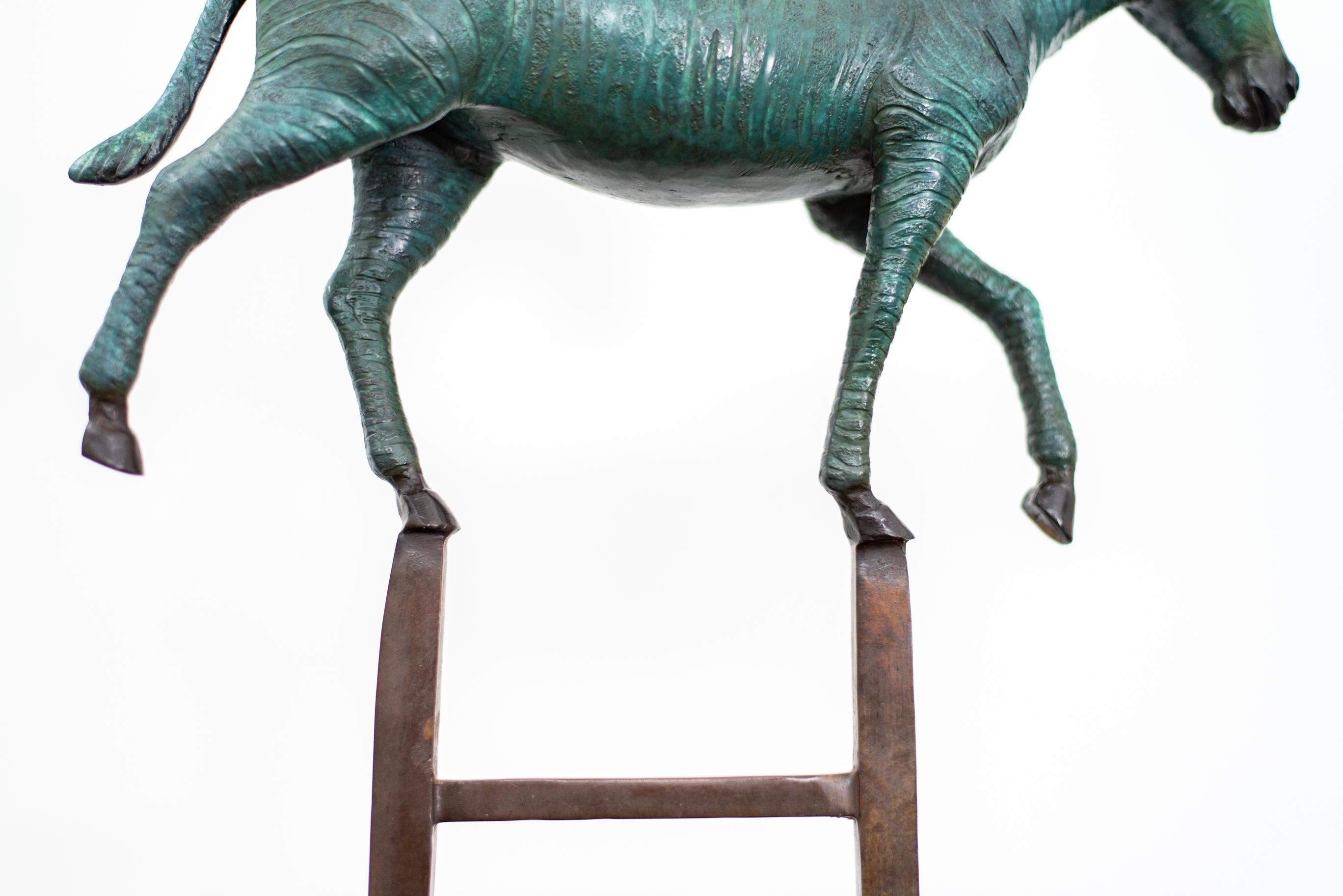 Zebra Reaches New Heights 1/15 - figurative, playful, bronze, tabletop sculpture - Gold Figurative Sculpture by Gillie and Marc Schattner