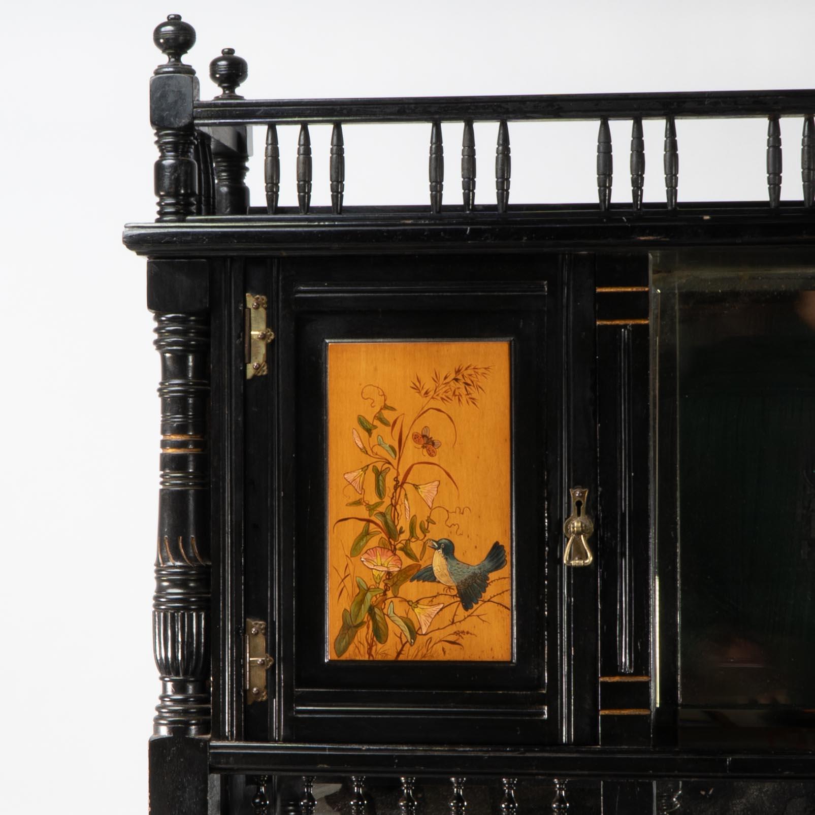 Walnut Gillows. A fine Aesthetic Movement side cabinet with hand painted floral panels For Sale