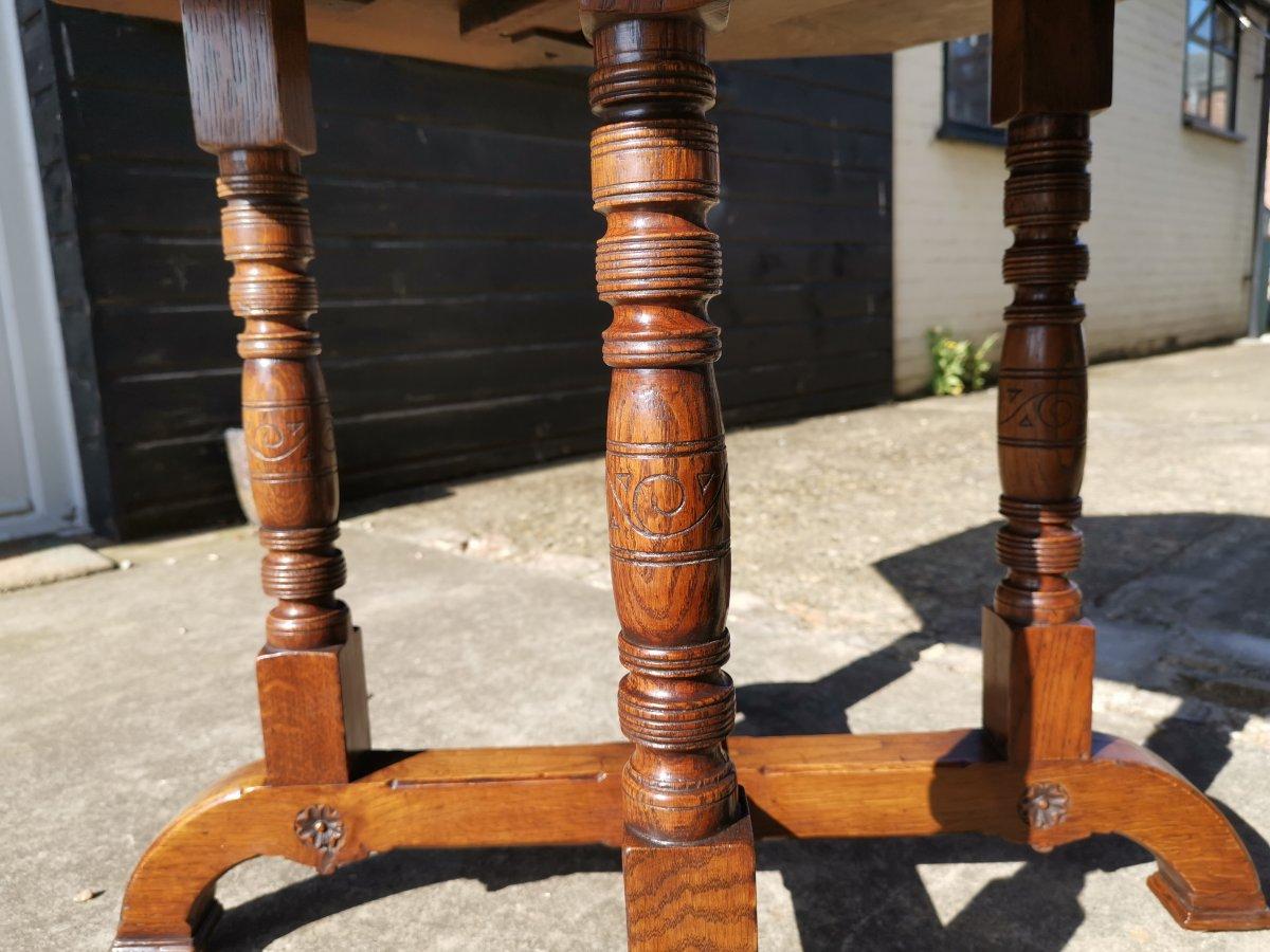 Gillows, an Aesthetic Movement Oak Octagonal Drop-Leaf Centre Table with Florets 3