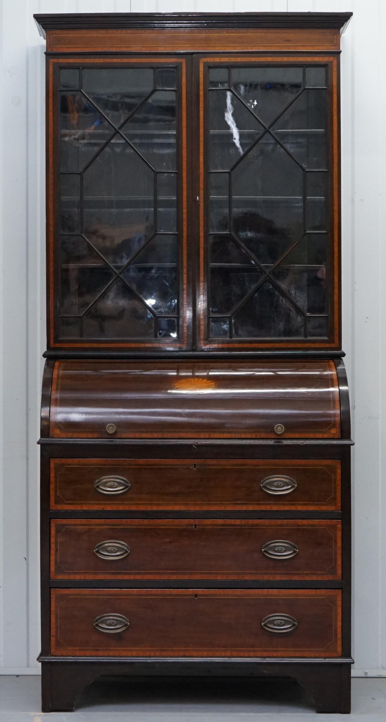We are delighted to offer for auction this lovely roll top bureau bookcase attributed to Gillows of Lancaster and London.

A stunning piece, the top section is Astral Glazed which was very popular with exceptionally high end cabinets in the