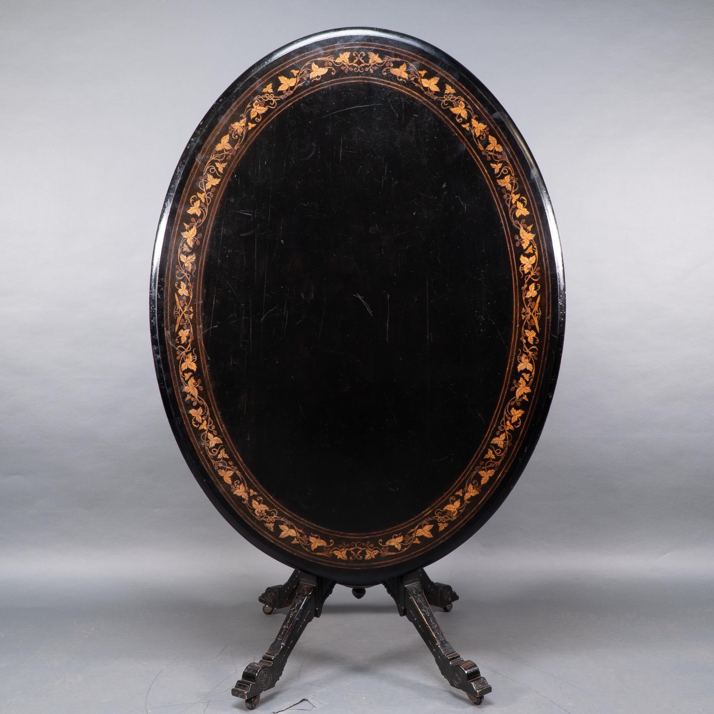 Gillows attr. An Aesthetic Movement tilt top dining table with floral inlays For Sale 4