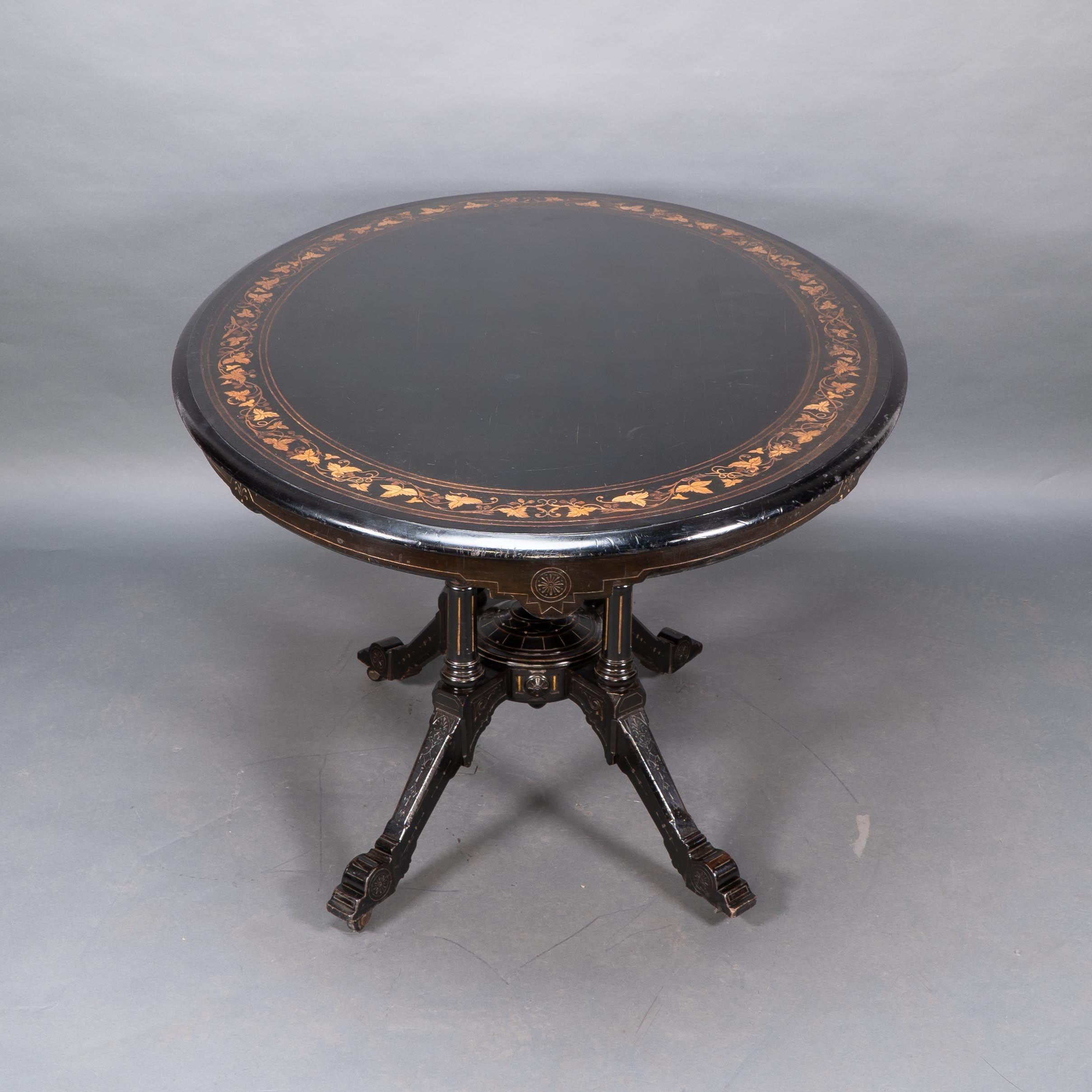 Gillows attr. An Aesthetic Movement tilt top dining table with floral inlays In Good Condition For Sale In London, GB