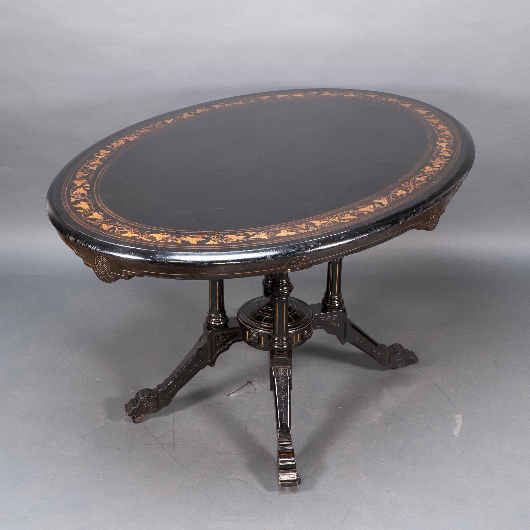 Late 19th Century Gillows attr. An Aesthetic Movement tilt top dining table with floral inlays For Sale