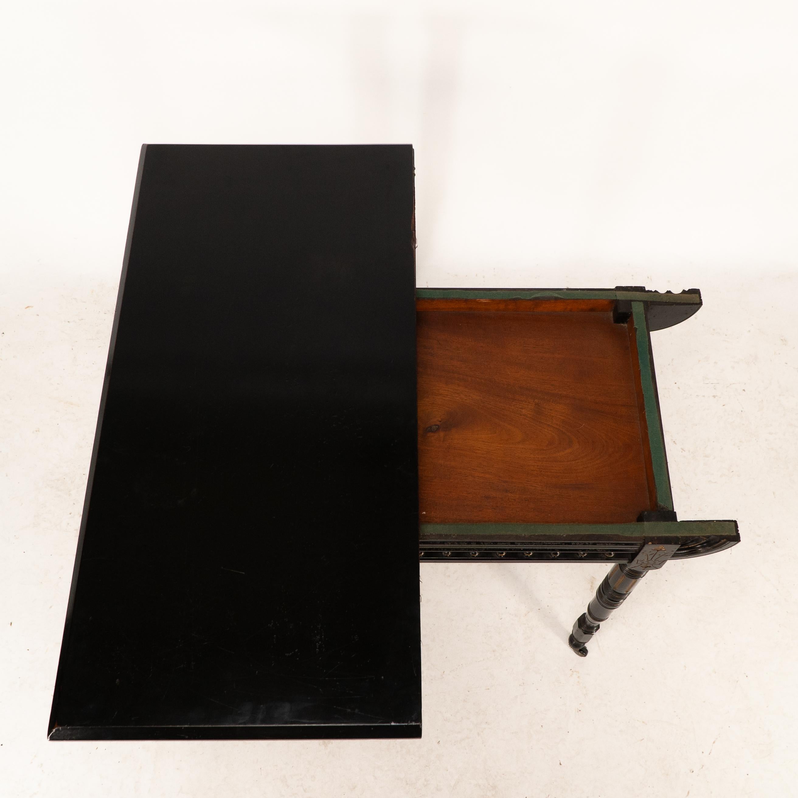 Gillows attributed. An Aesthetic Movement ebonized games and card table 3