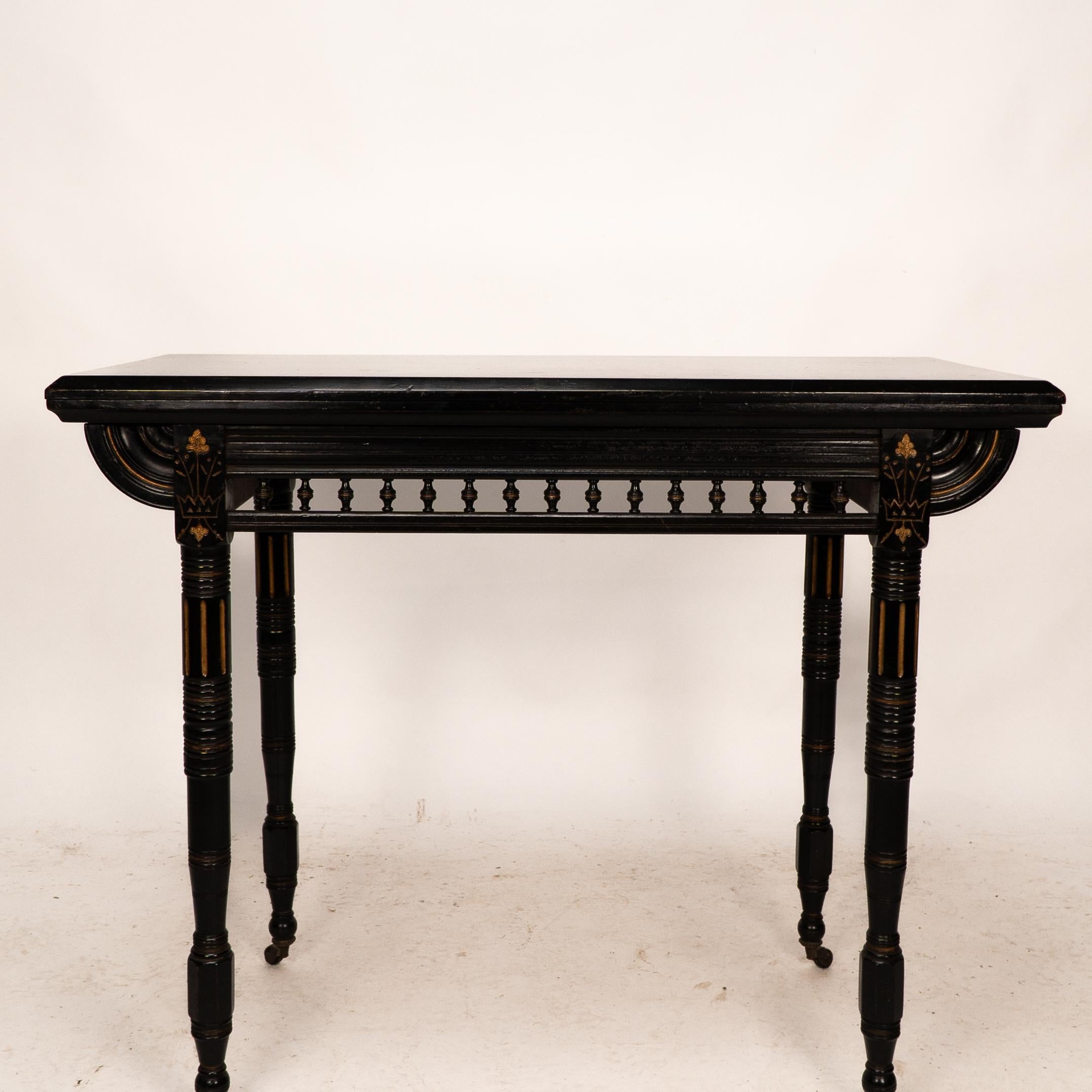 Gillows attributed. An Aesthetic Movement ebonized games and card table 7