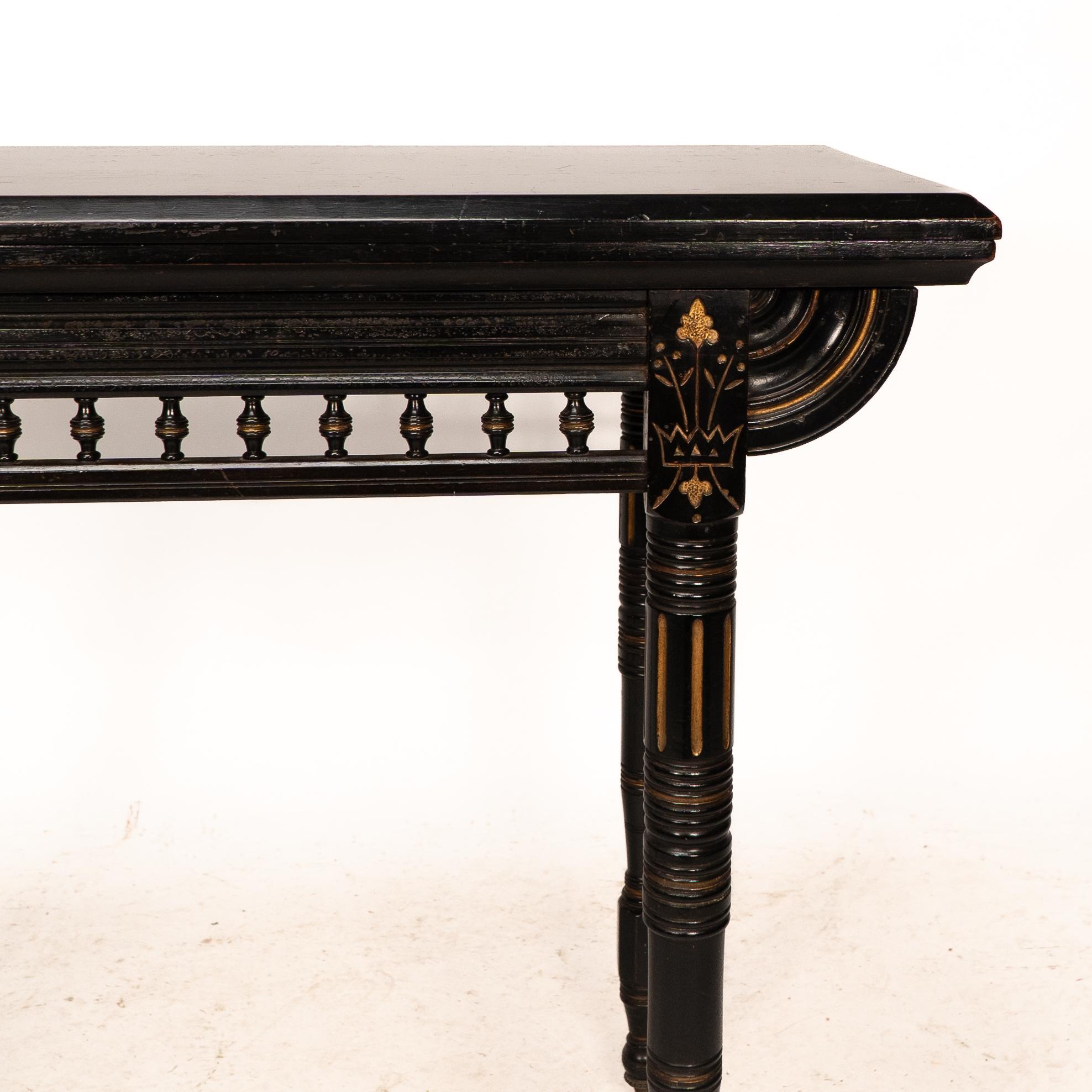 Gillows attributed. An Aesthetic Movement ebonized games and card table 9