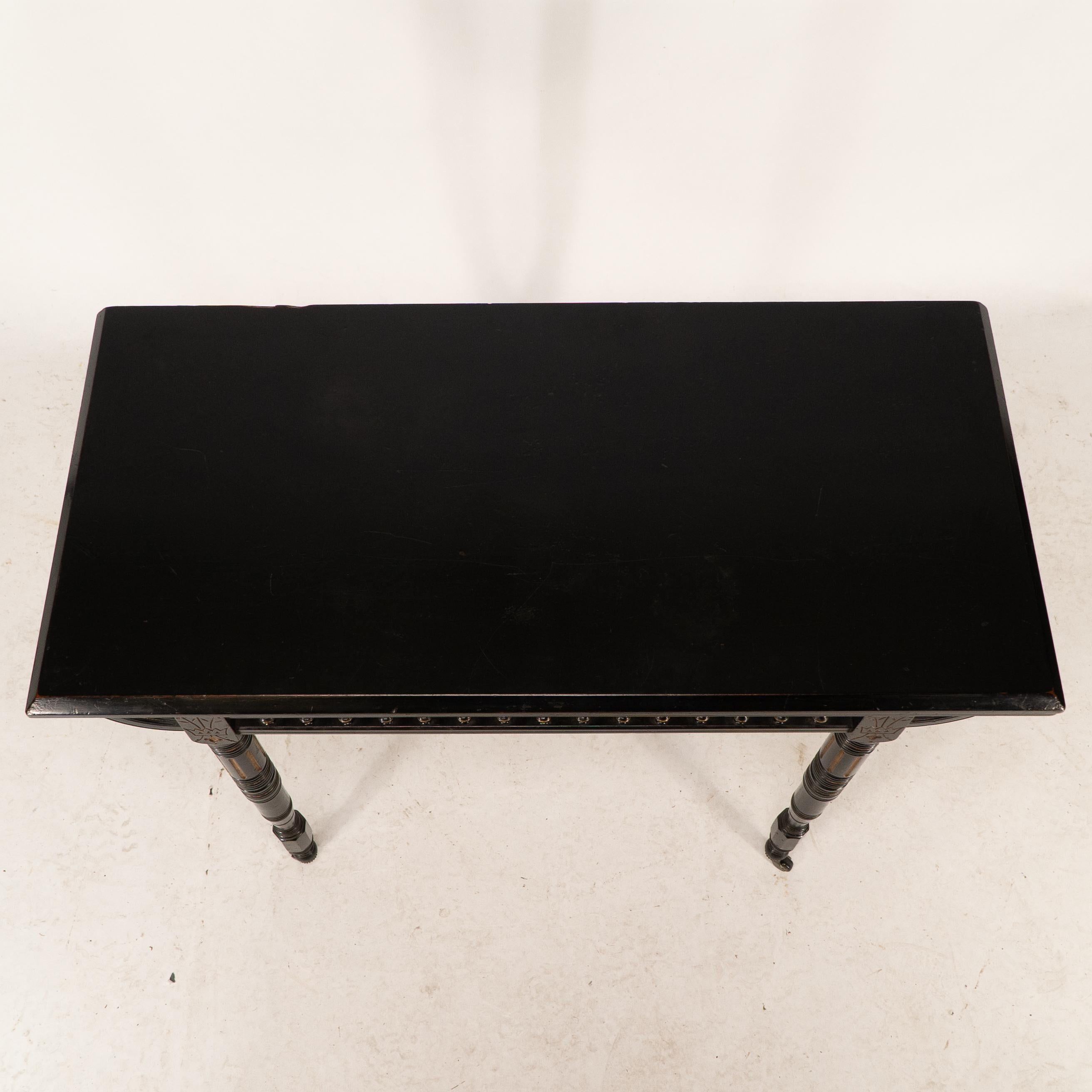 Gillows attributed. An Aesthetic Movement ebonized games and card table For Sale 2