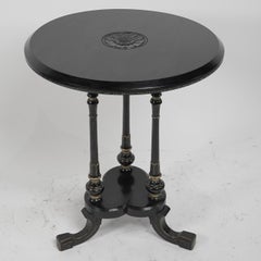 Gillows of Lancaster An Aesthetic Movement ebonized circular side table