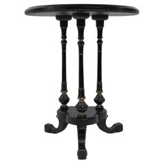 Antique Gillows of Lancaster An Aesthetic Movement ebonized circular side table