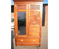 Gillow's of Lancaster, an Aesthetic Movement Walnut Armoire Wardrobe Compactum