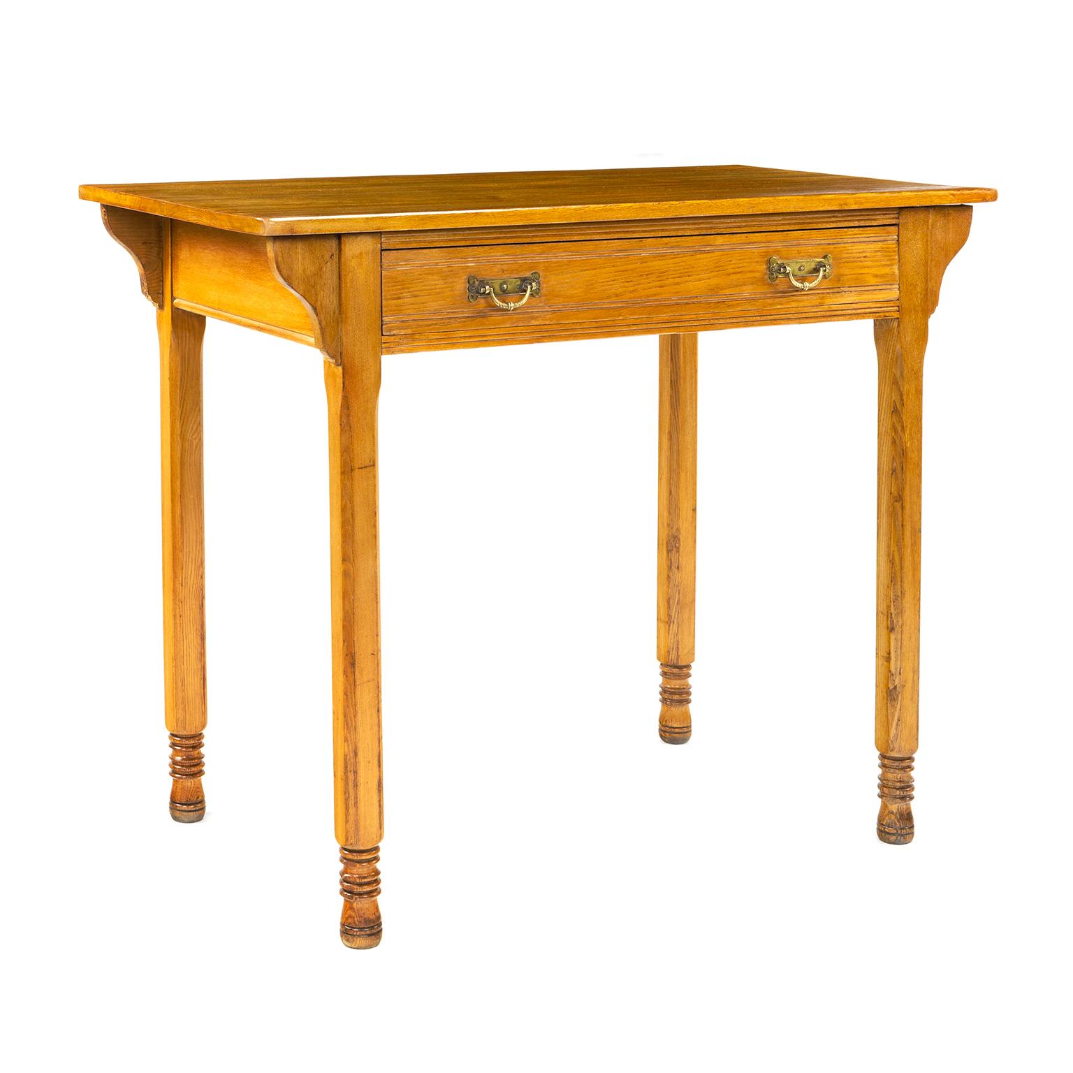 An ash side table by Gillows of Lancaster and London, signed by the maker, 19th century. This type of table is versatile and was used in hallways, bedrooms and living areas. As well as the makers stamp this table carries the letters L 13194 this is