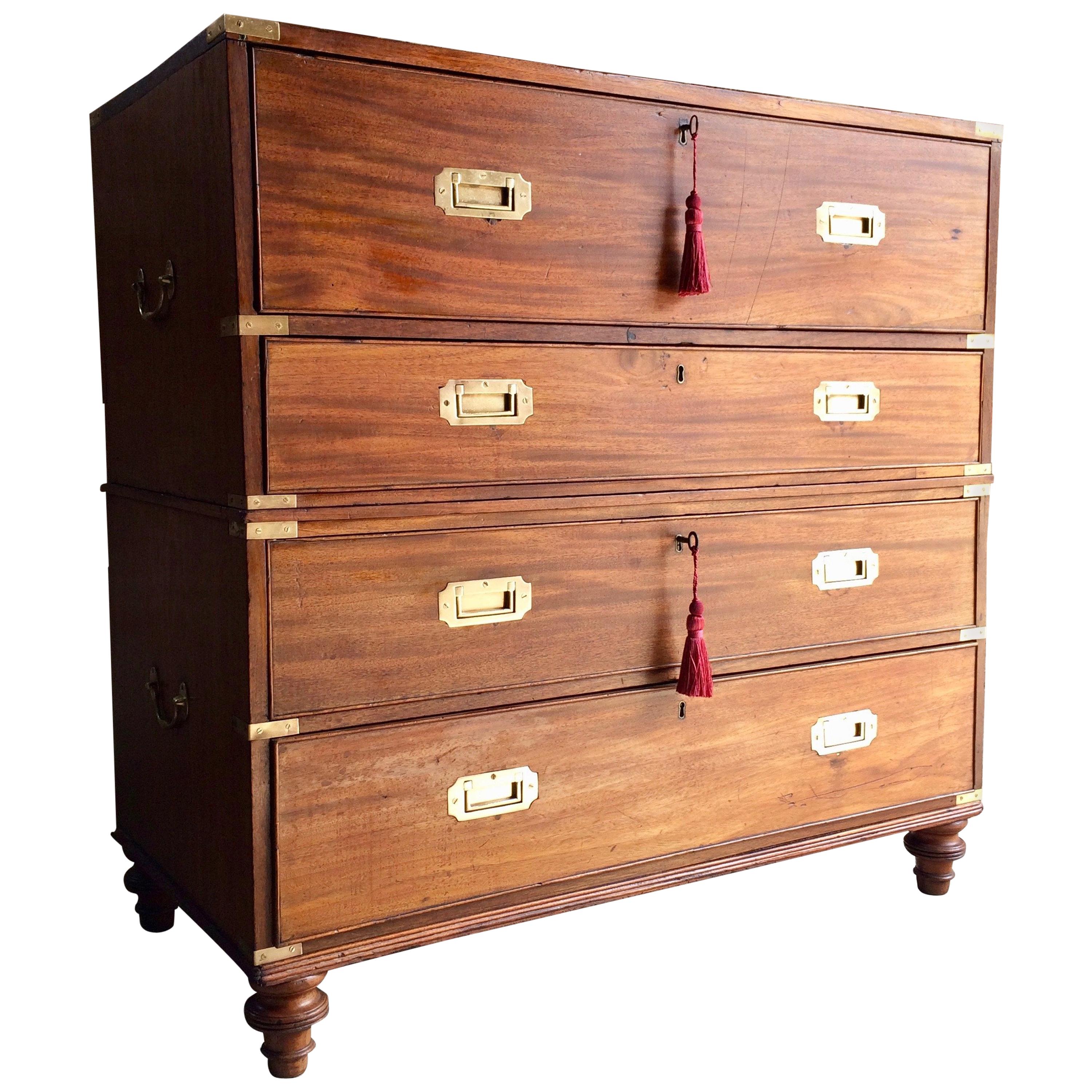 A magnificent and rare mid-19th century 'Gillows of Lancaster' two part Mahogany secretaire Campaign chest of drawers circa 1850, the upper section of the chest having a pullout / pull-out secretaire drawer enclosing a fully fitted interior with