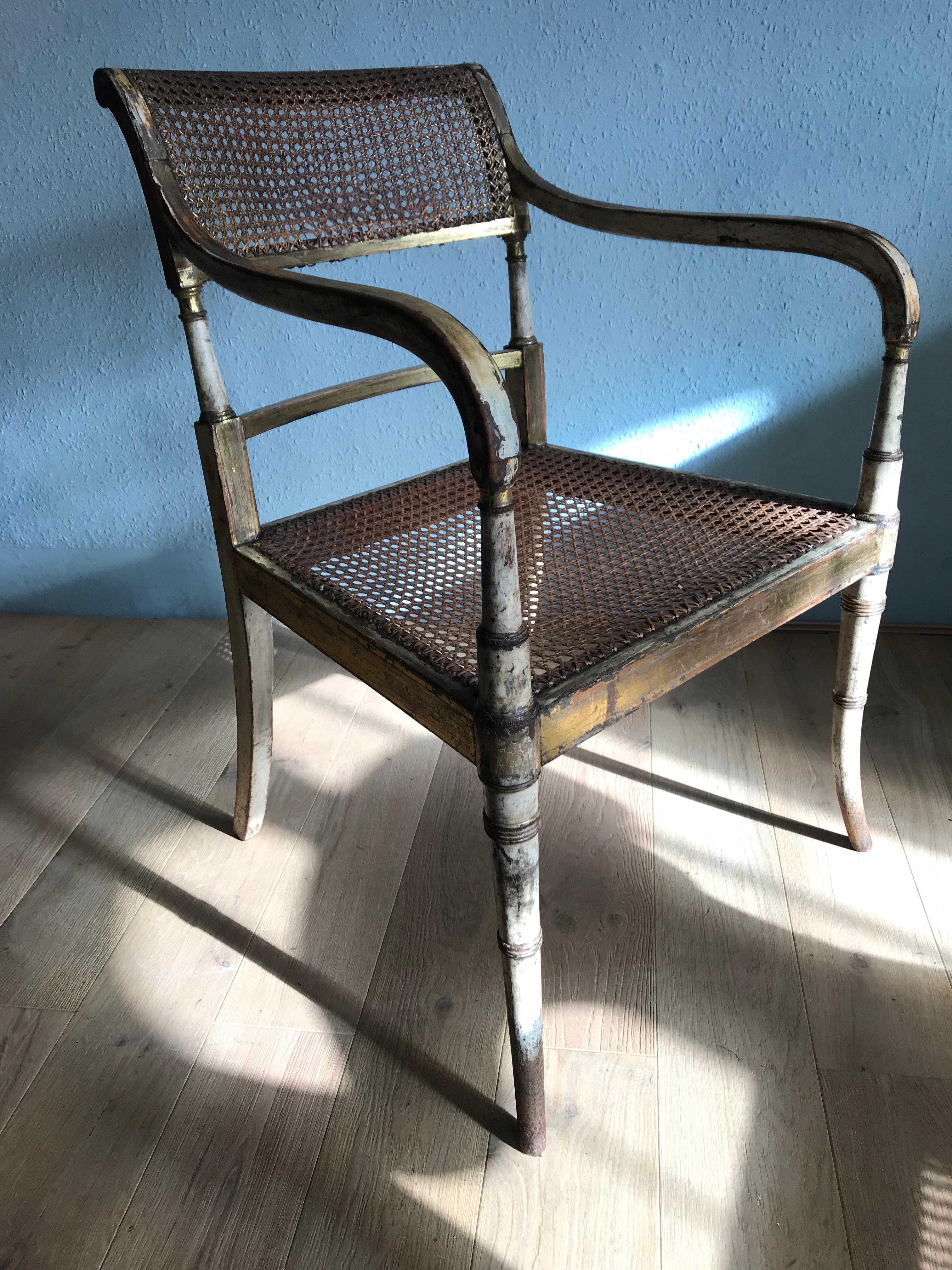 Untouched stunning Gillows of Lancaster and London George 3rd cream painted and parcel gilt arm chair, in its original warn through condition. This chair has never been apart and retains its original cane seat and back. It has the journey man’s