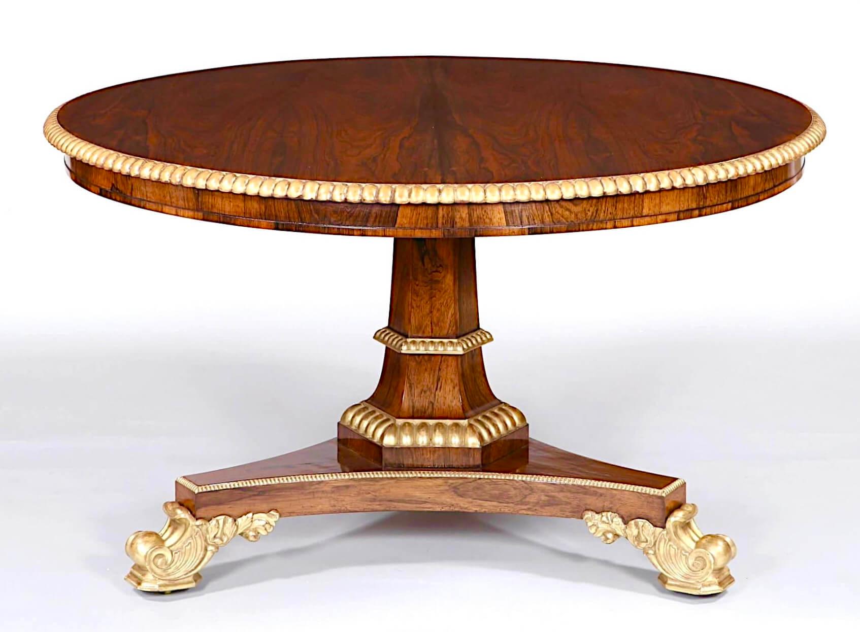 Exceptionnelle et importante table centrale en palissandre doré parcellaire de la légendaire firme Gillows of Lancaster, d'époque George IV, datant d'environ 1825. Le grand plateau circulaire basculant avec d'exquis placages assortis et un bord