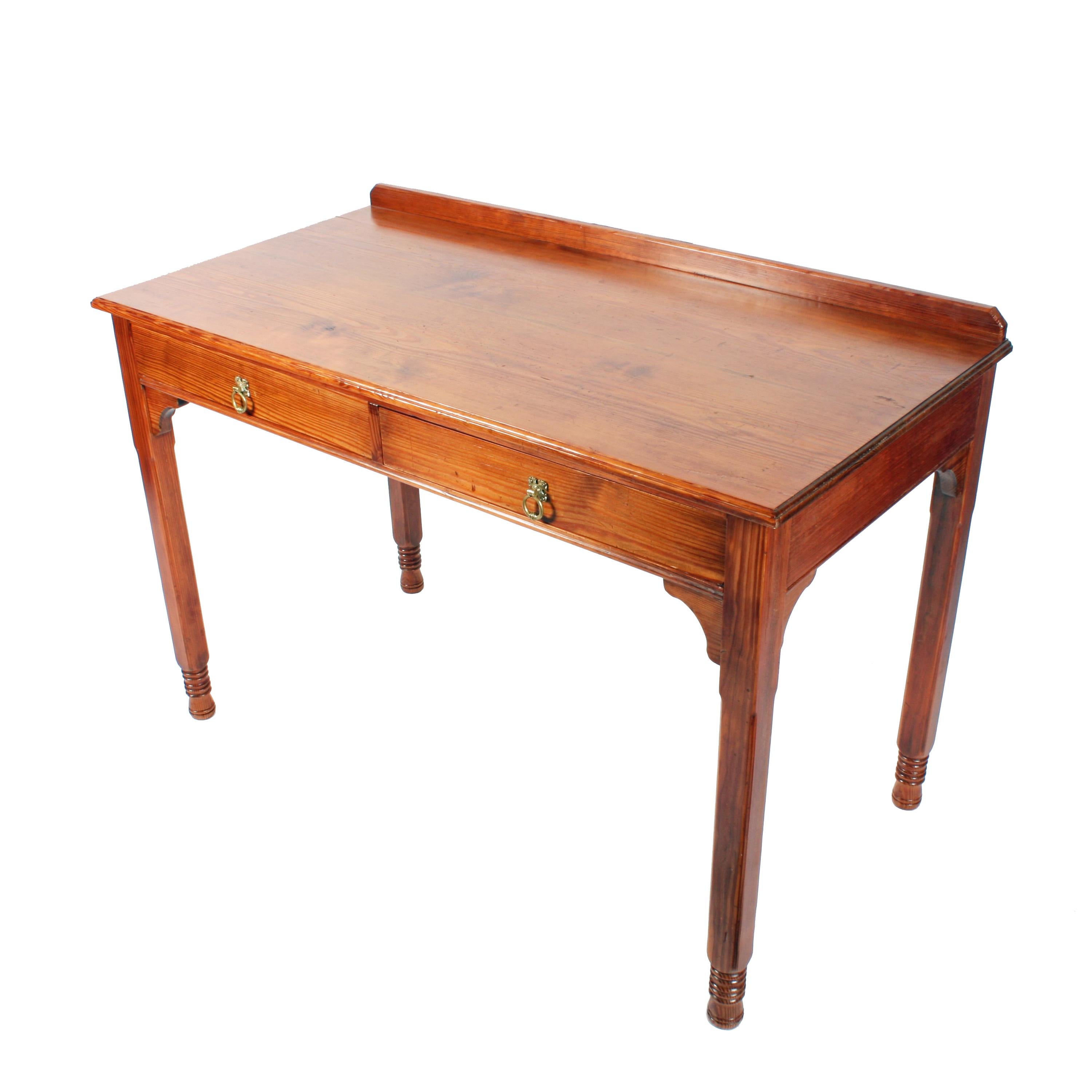 Gillows of Lancaster two-drawer pine table.


A 19th century pitch pine two drawer side table stamped Gillows of Lancaster.

The table has square legs with a chamfered edge and a low gallery back.

The two drawers are pine lined and have