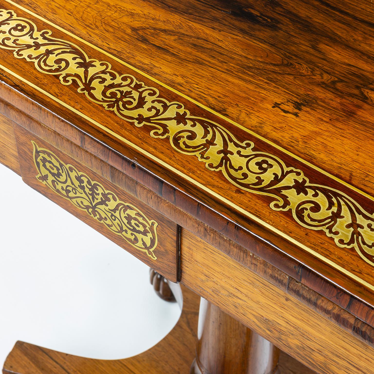 Regency rosewood card table, heavily decorated with brass, attributed to Gillows of Lancaster.

Gillows of Lancaster and London, also known as Gillow & Co., was an English furniture making firm based in Lancaster, Lancashire, and in London. It was