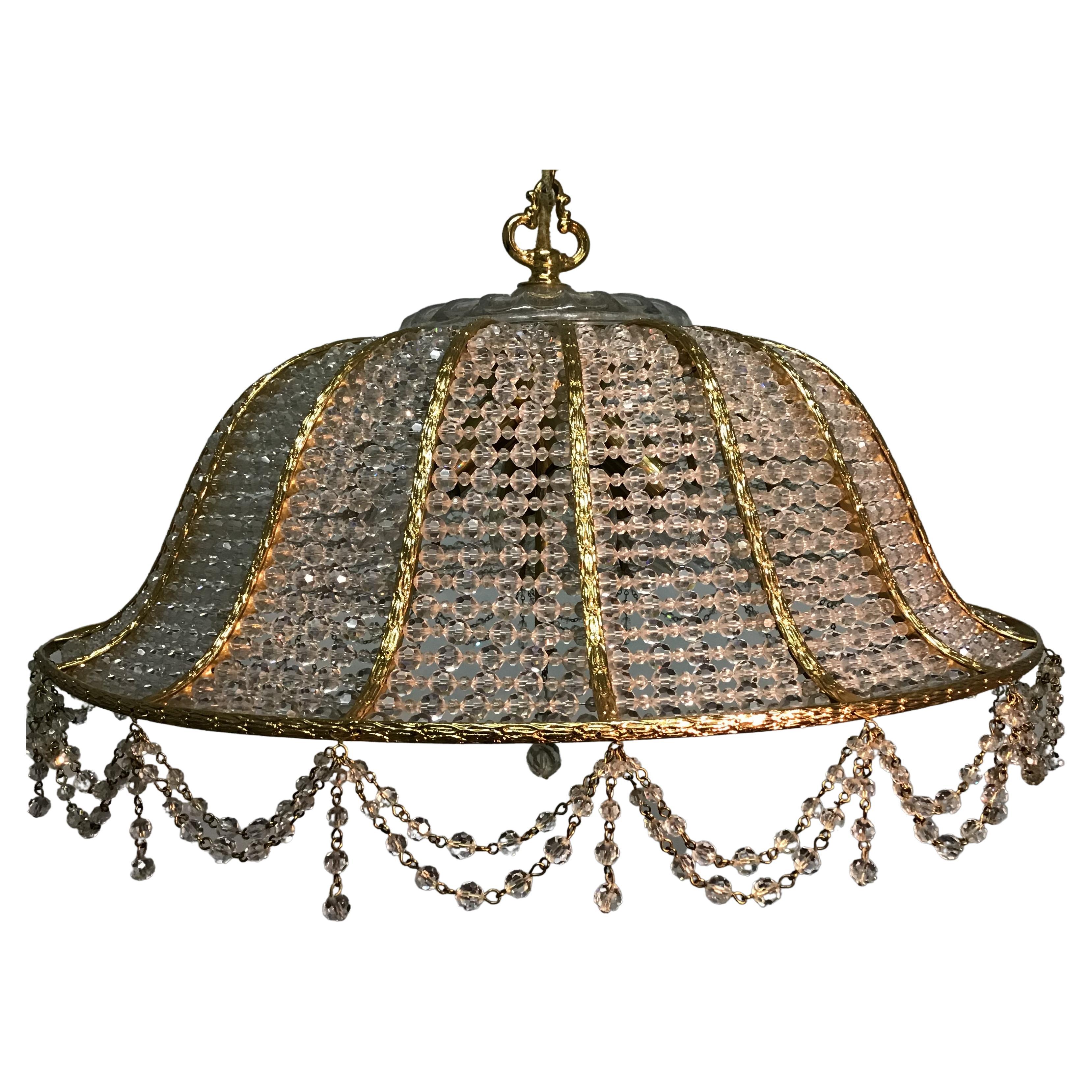 A large Regency style six-light gilt brass and crystal pearls chandelier by Palwa, Germany, circa 1960s.
Socket: 6 x E14 for standard screw bulbs.

