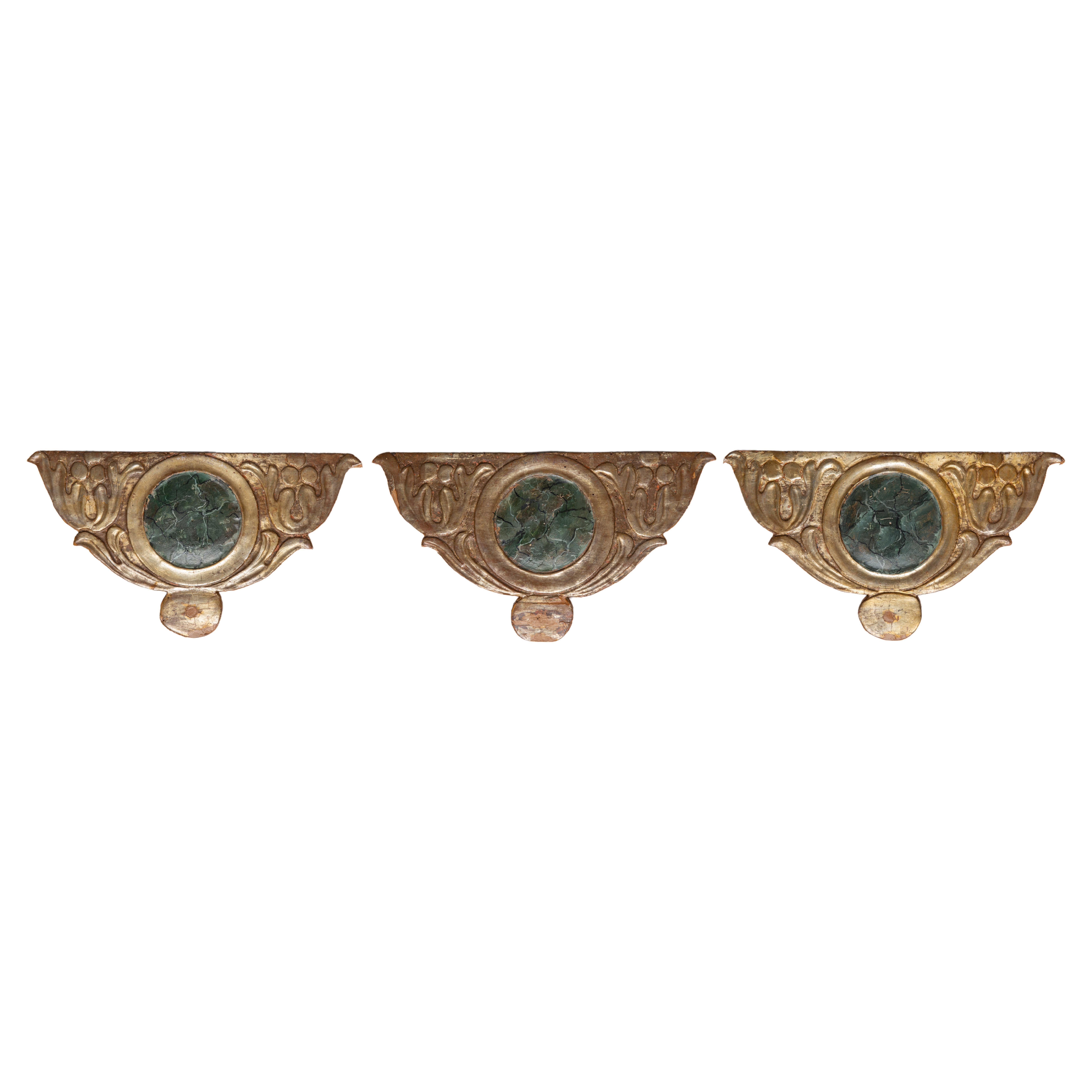 O/4738 - An idea for these three gilt and lacquered friezes , for wall light sconces: on the wall, hanging above three parchment fans that hide the electrical connections.  The parchment fan photographed is only for example.