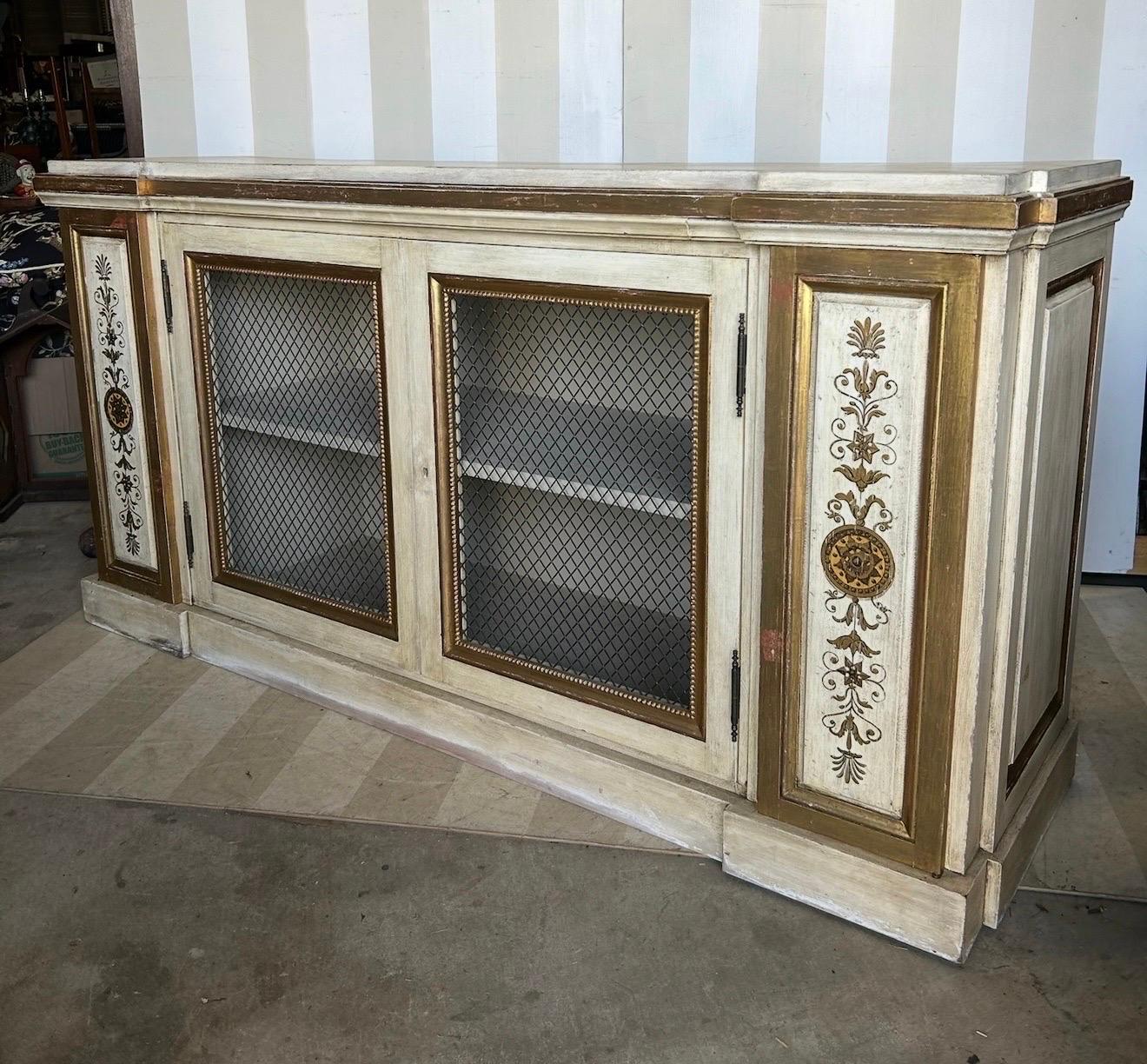 Gilt and paint decorated Neoclassical style cabinet from newel For Sale 4