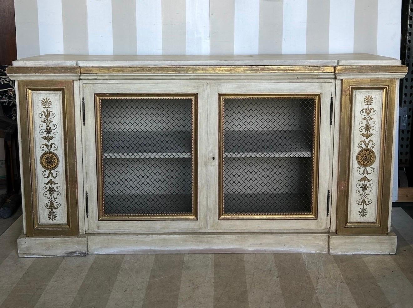 Gilt and paint decorated Neoclassical style cabinet from newel In Good Condition For Sale In Richmond, VA