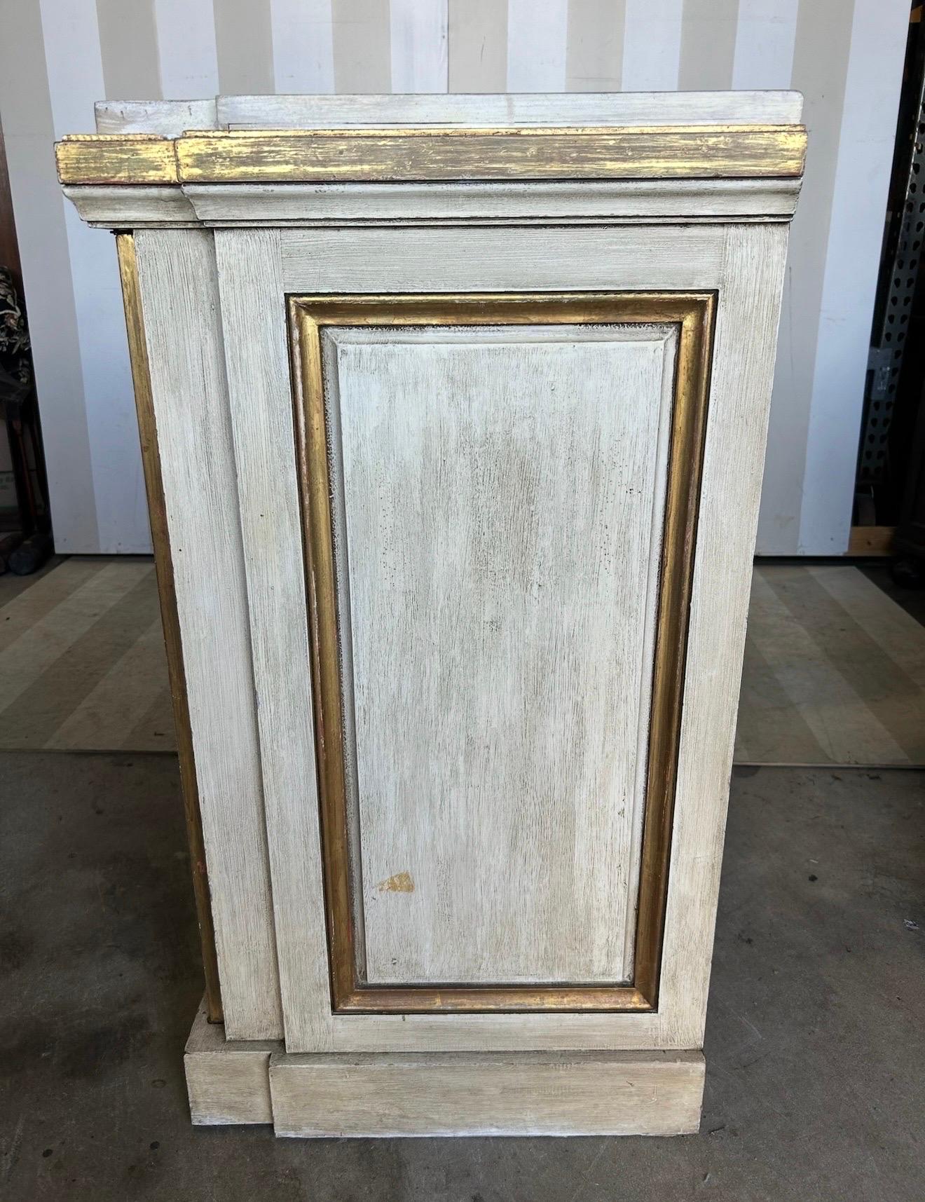 20th Century Gilt and paint decorated Neoclassical style cabinet from newel For Sale