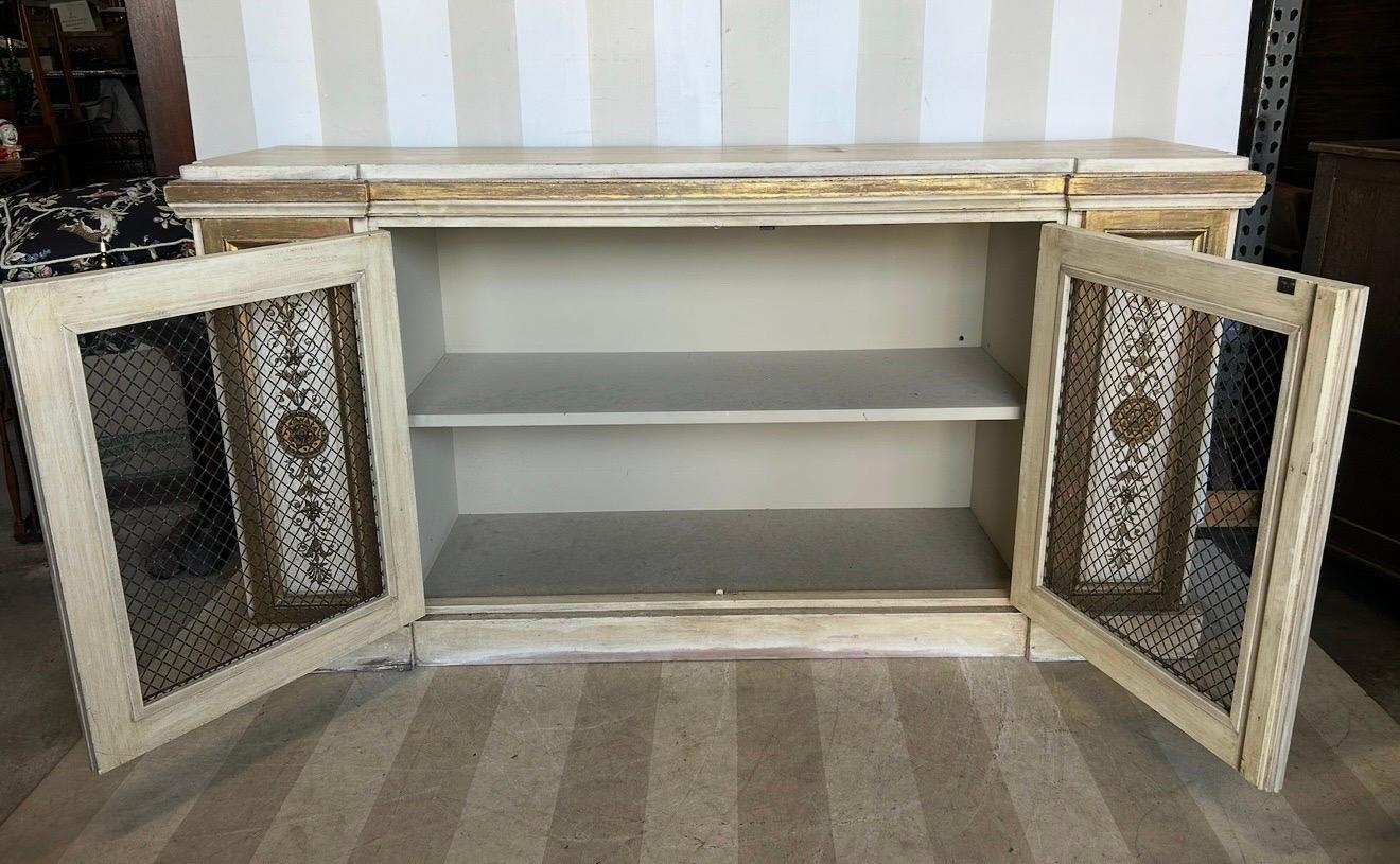 Gilt and paint decorated Neoclassical style cabinet from newel For Sale 1