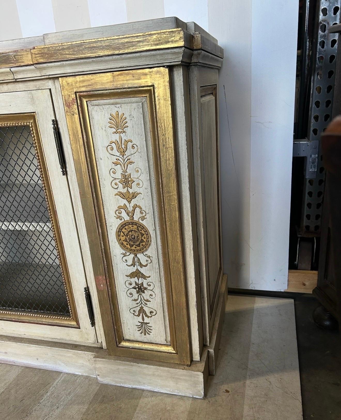 Gilt and paint decorated Neoclassical style cabinet from newel For Sale 2