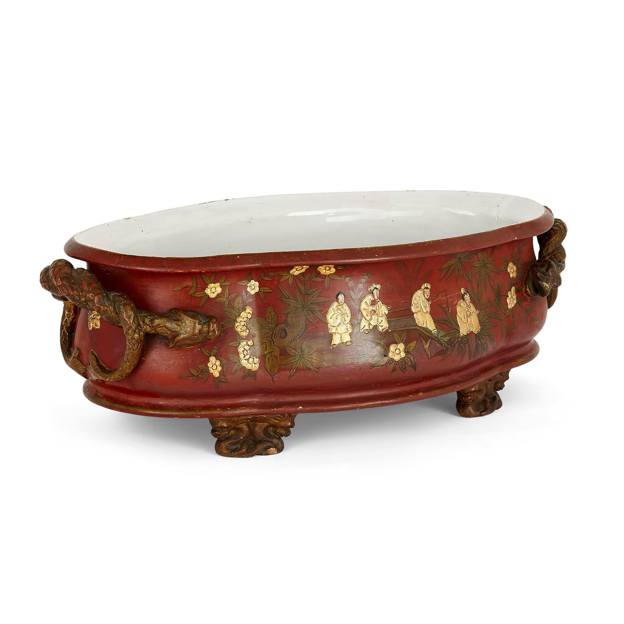 Gilt and painted Chinoiserie style terracotta jardinière
Continental, early 20th century
Measures: Height 19cm, width 55cm, depth 32cm

This charming terracotta jardinière was crafted in Europe in the Chinoiserie style. The ovoid jardinière
