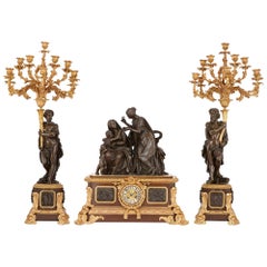 Ensemble d'horloges françaises anciennes en bronze doré et patiné de Picard