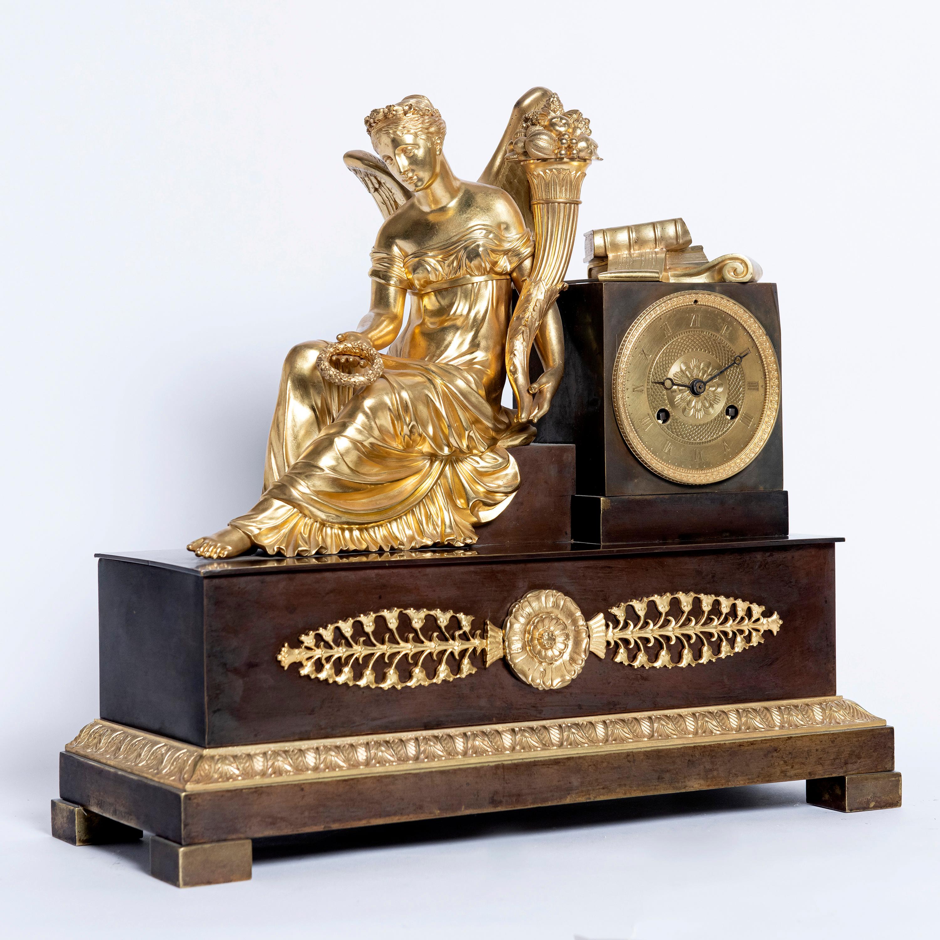Gilt and patinated bronze mantel clock, machine signed L. Moinet A Paris. France, early 19th century.