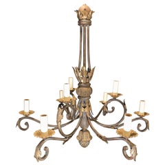Lampadario in ferro dorato e patinato