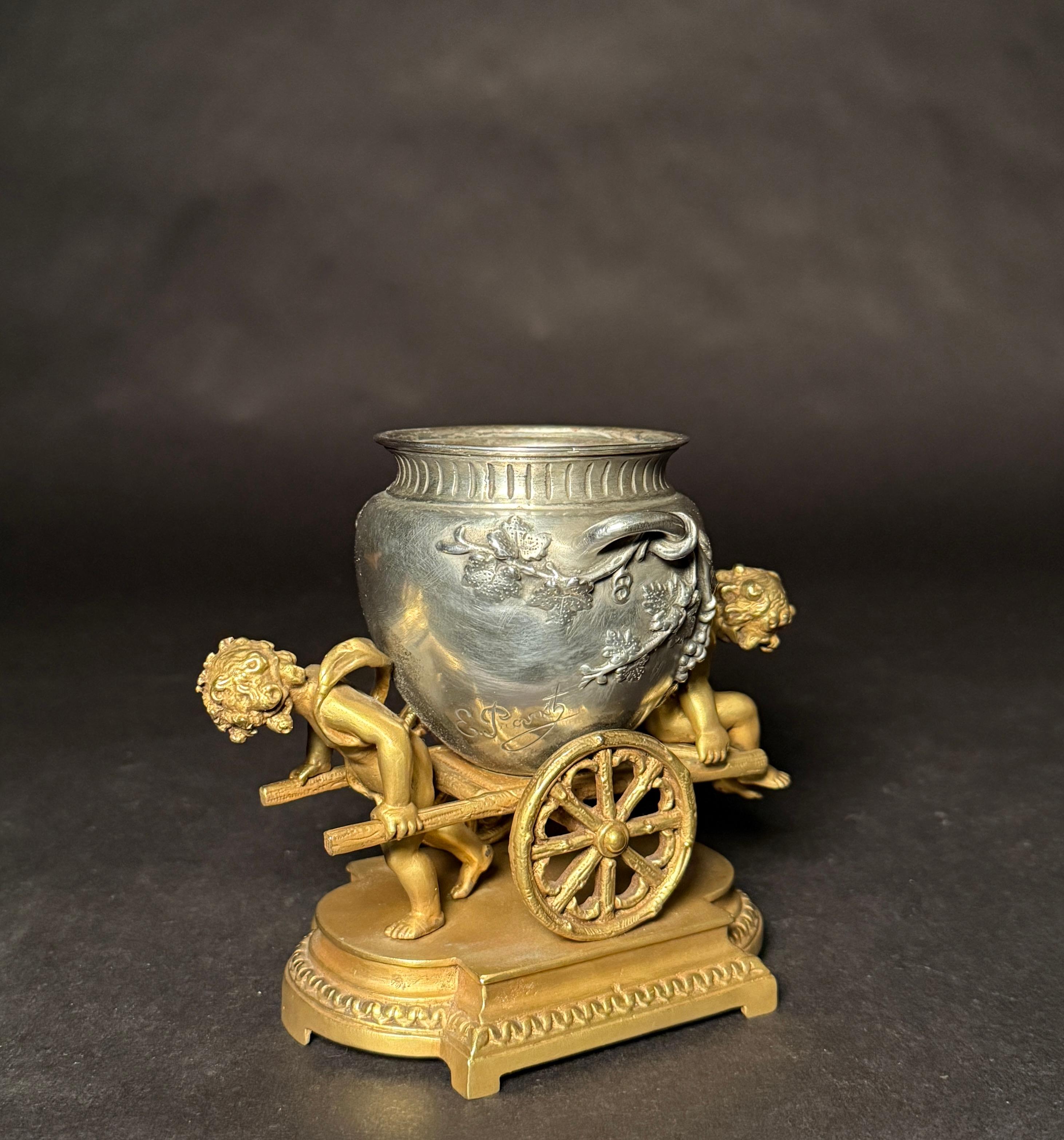 19th Century Gilt And Silvered Bronze Table Ornament With Putti And Urn For Sale