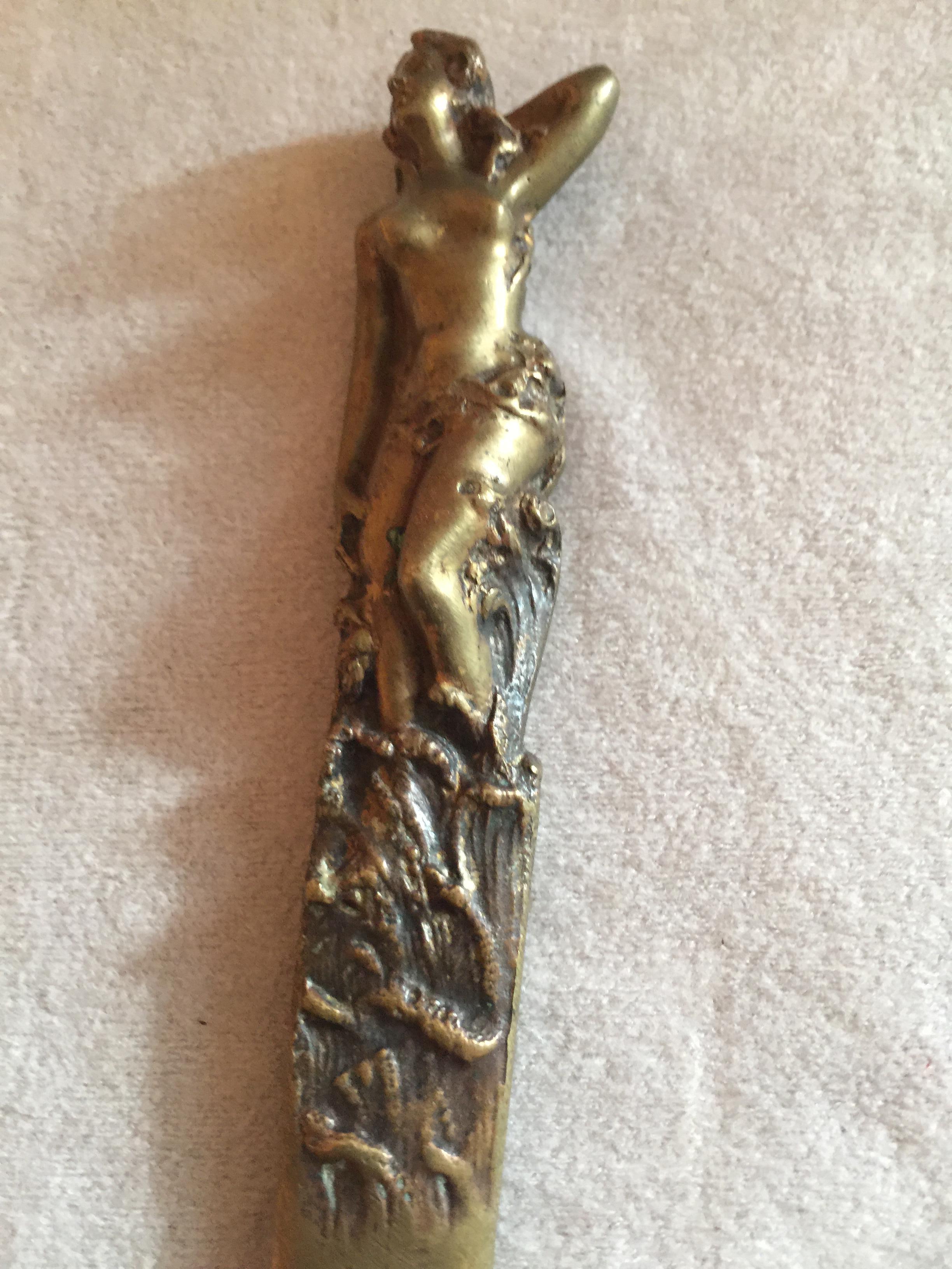We bought a nice collection of antique letter openers, and this is probably the best one of the batch. Not much to say here other than she is sexy, beautiful and sure would look nice on a desk. Wouldn't it be nice to sit down at you desk and every