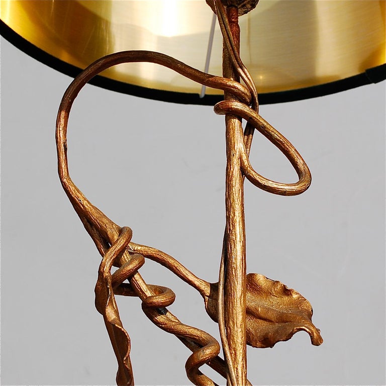 One-off sculpted gilt metal table lamp with an organic, foliate base made from twisted, curled branches, stems and large leaves. The surface is lightly textured, adding extra character. The shape is quintessentially Art Nouveau, very romantic and