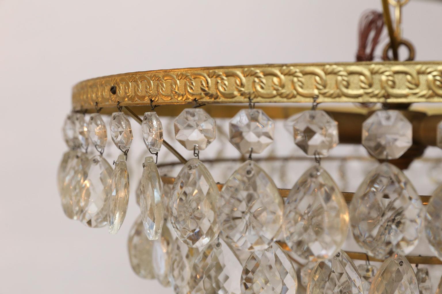 Cast Gilt Brass and Crystal Mid century Modern Chandelier by Palwa with 4 Tiers