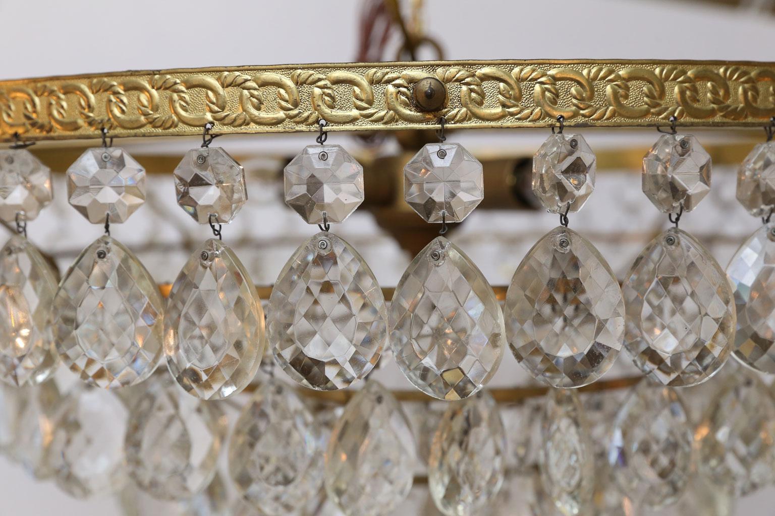 Gilt Brass and Crystal Mid century Modern Chandelier by Palwa with 4 Tiers In Good Condition In Houston, TX