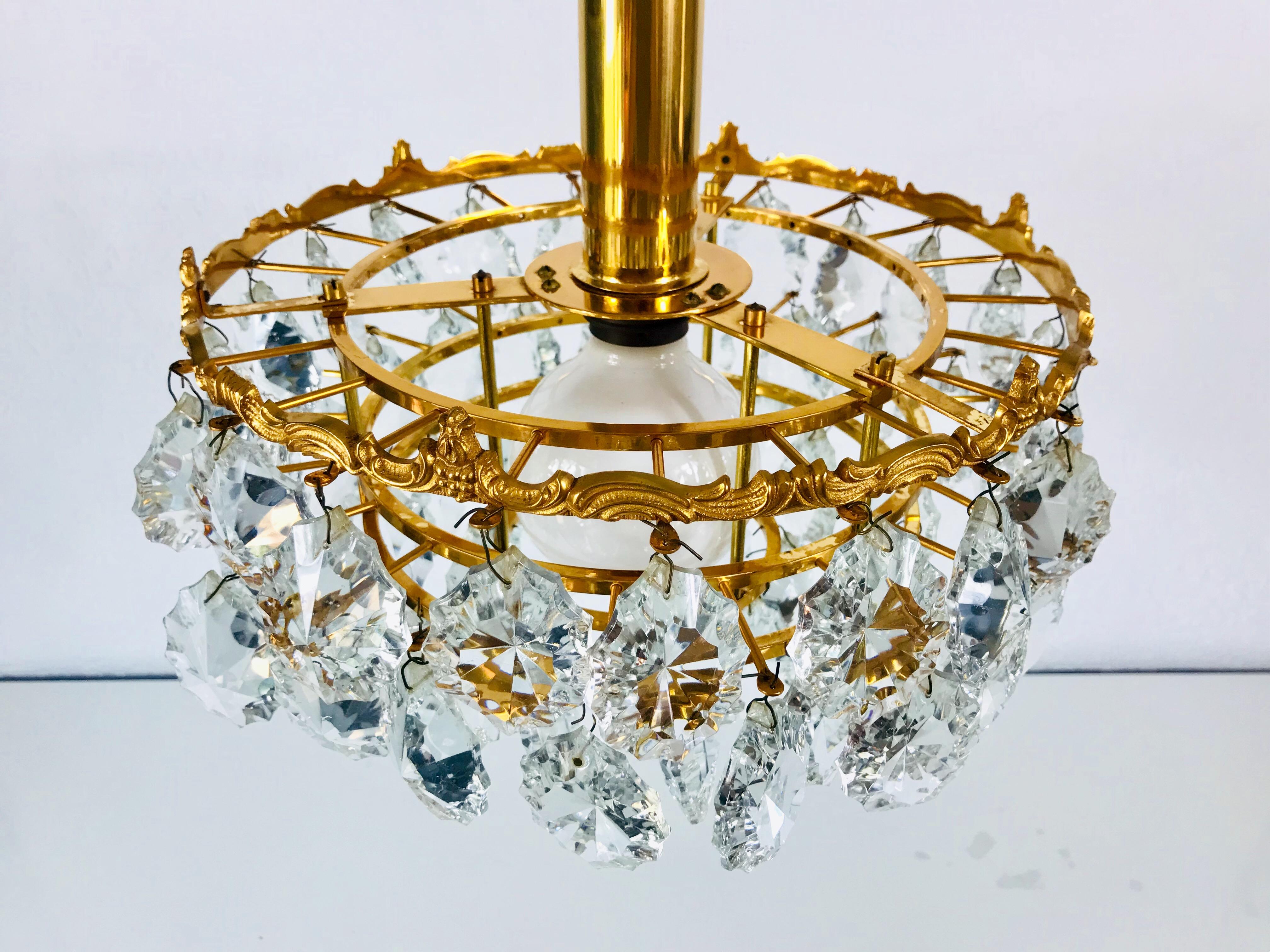 Gilt Brass and Crystal Glass 4-Tier Chandelier by Palwa, Germany, 1970s For Sale 8