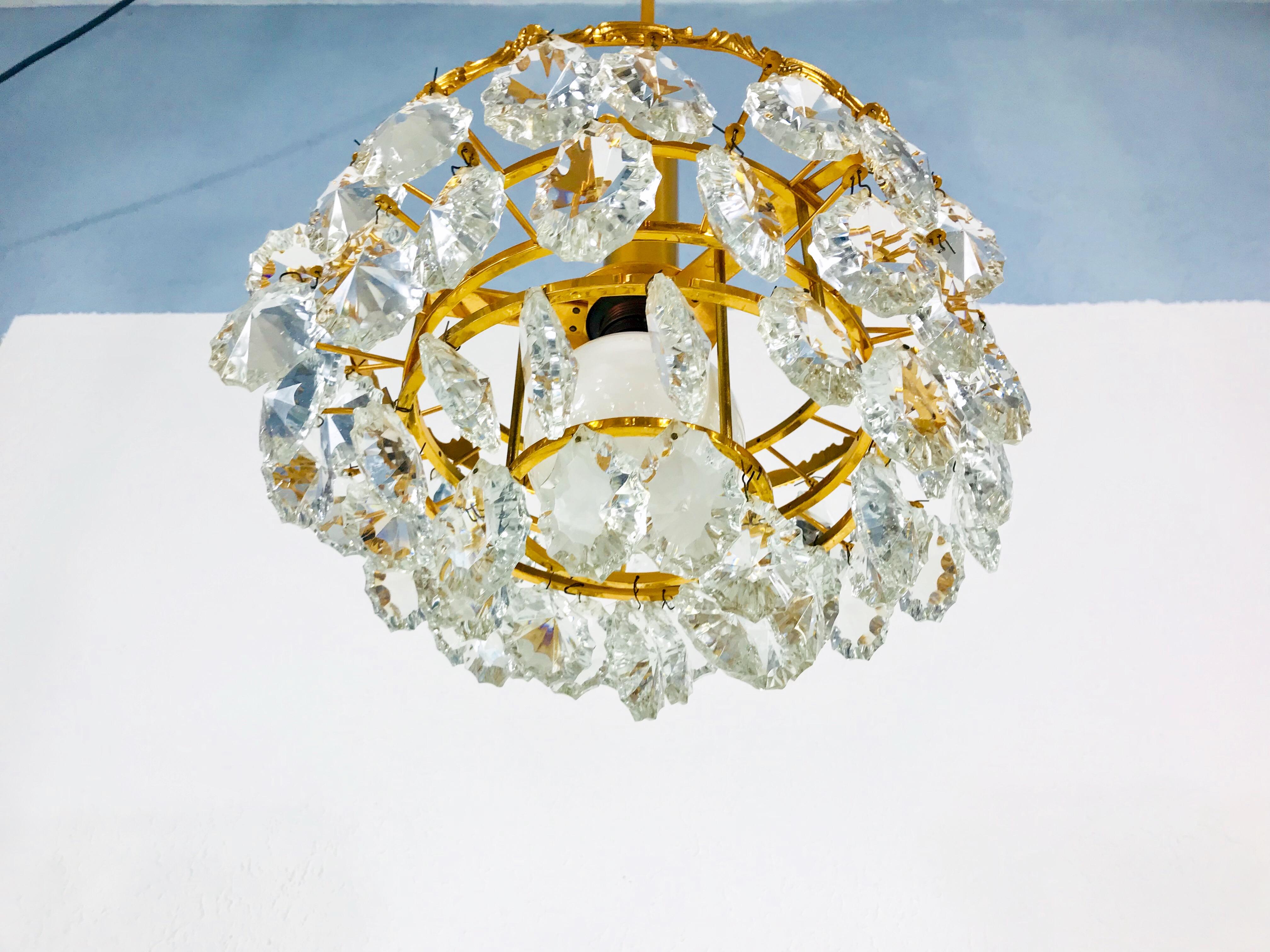 Gilt Brass and Crystal Glass 4-Tier Chandelier by Palwa, Germany, 1970s For Sale 9