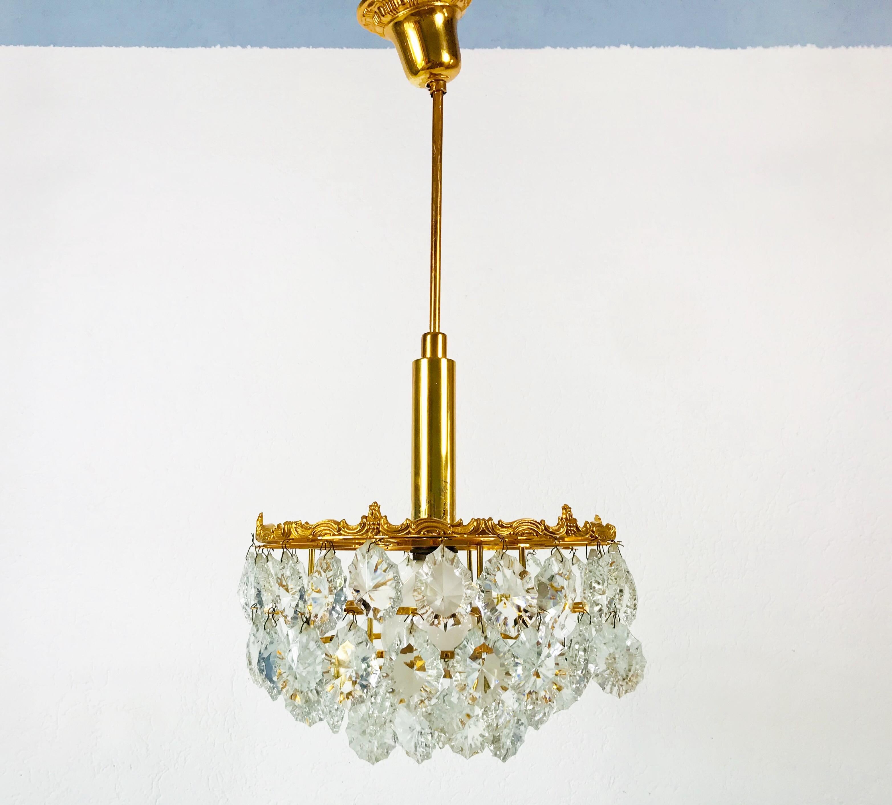 Gilt Brass and Crystal Glass 4-Tier Chandelier by Palwa, Germany, 1970s For Sale 10