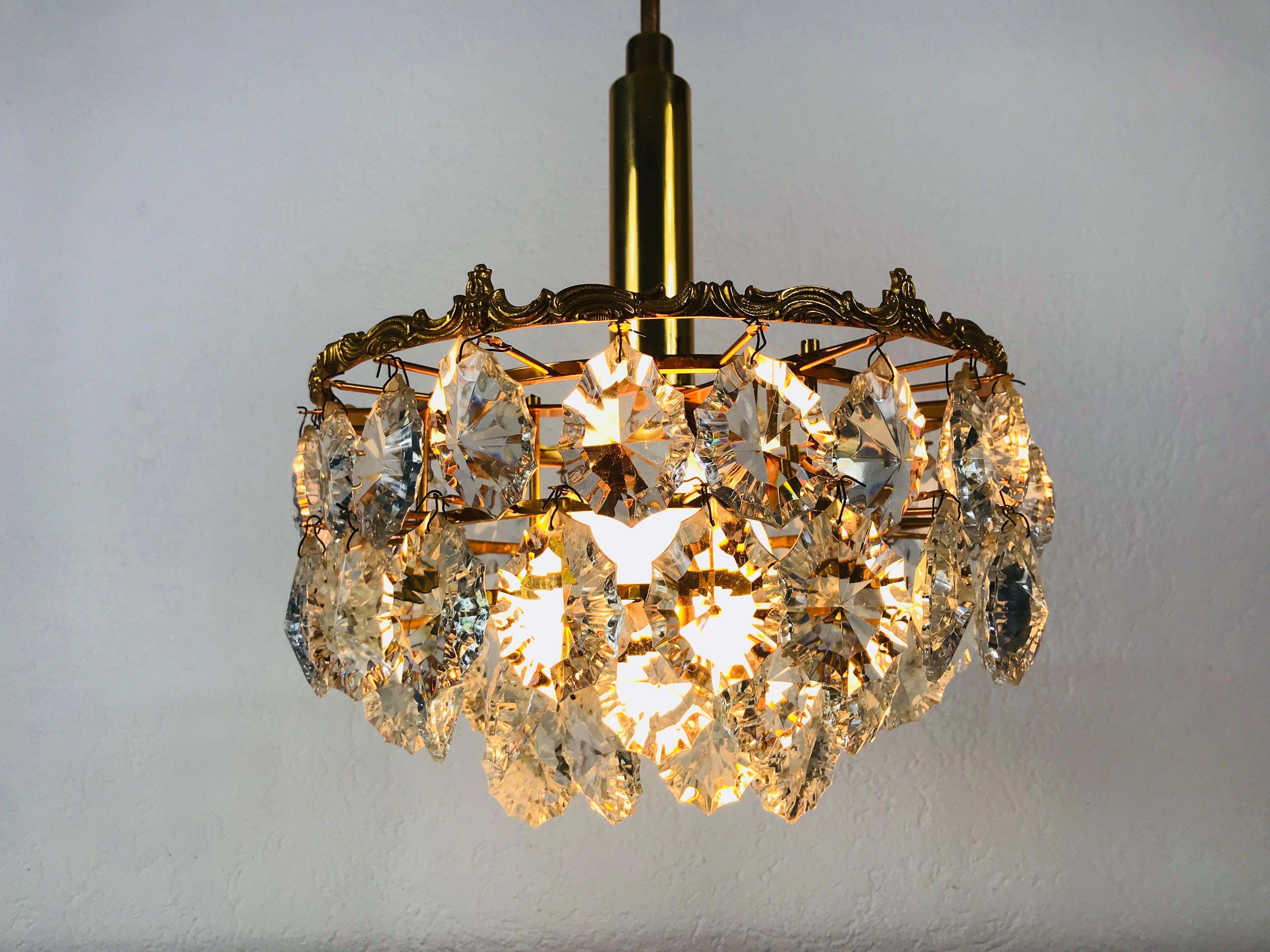 Gilt Brass and Crystal Glass 4-Tier Chandelier by Palwa, Germany, 1970s For Sale 1