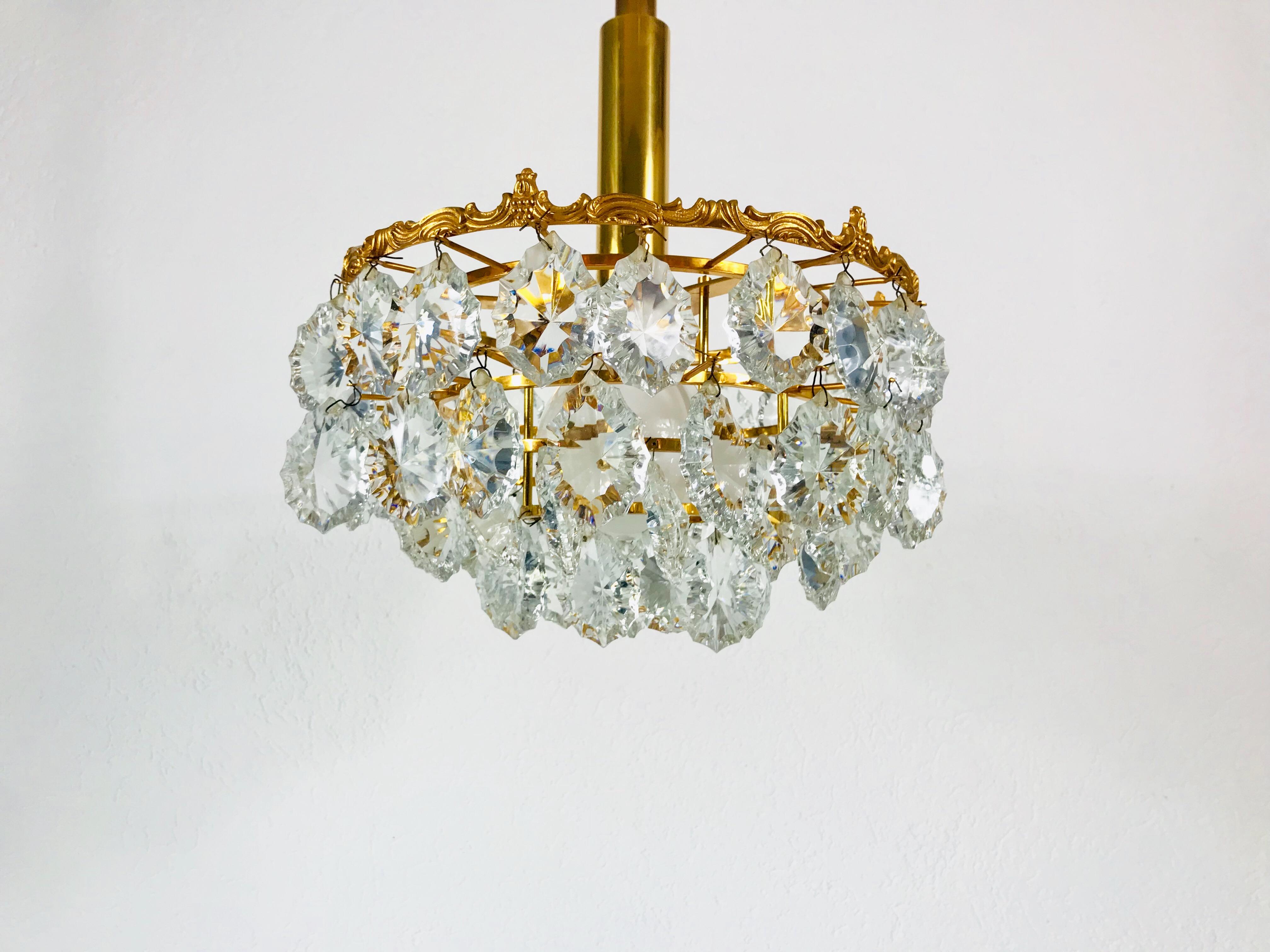 Gilt Brass and Crystal Glass 4-Tier Chandelier by Palwa, Germany, 1970s For Sale 3