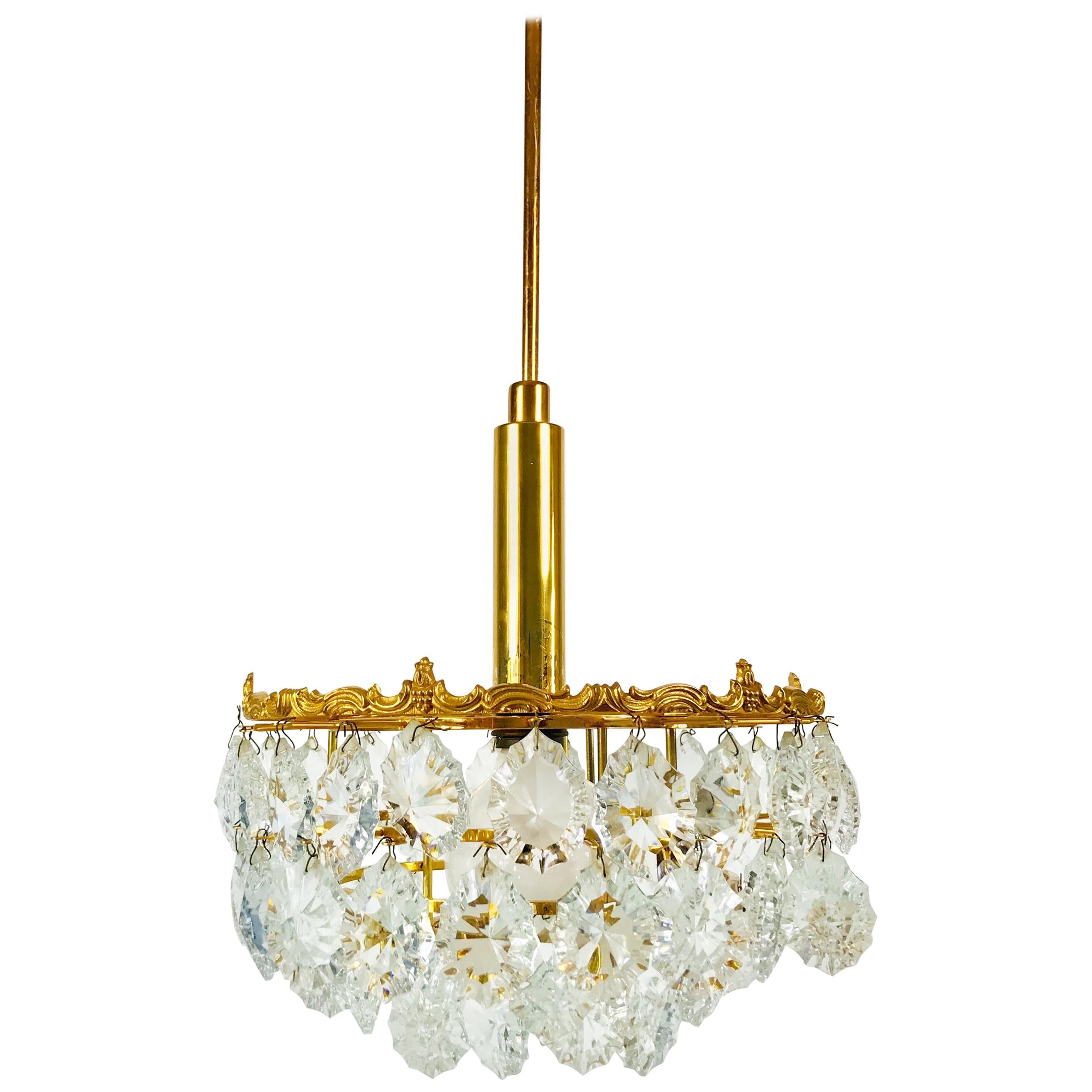 Gilt Brass and Crystal Glass 4-Tier Chandelier by Palwa, Germany, 1970s For Sale