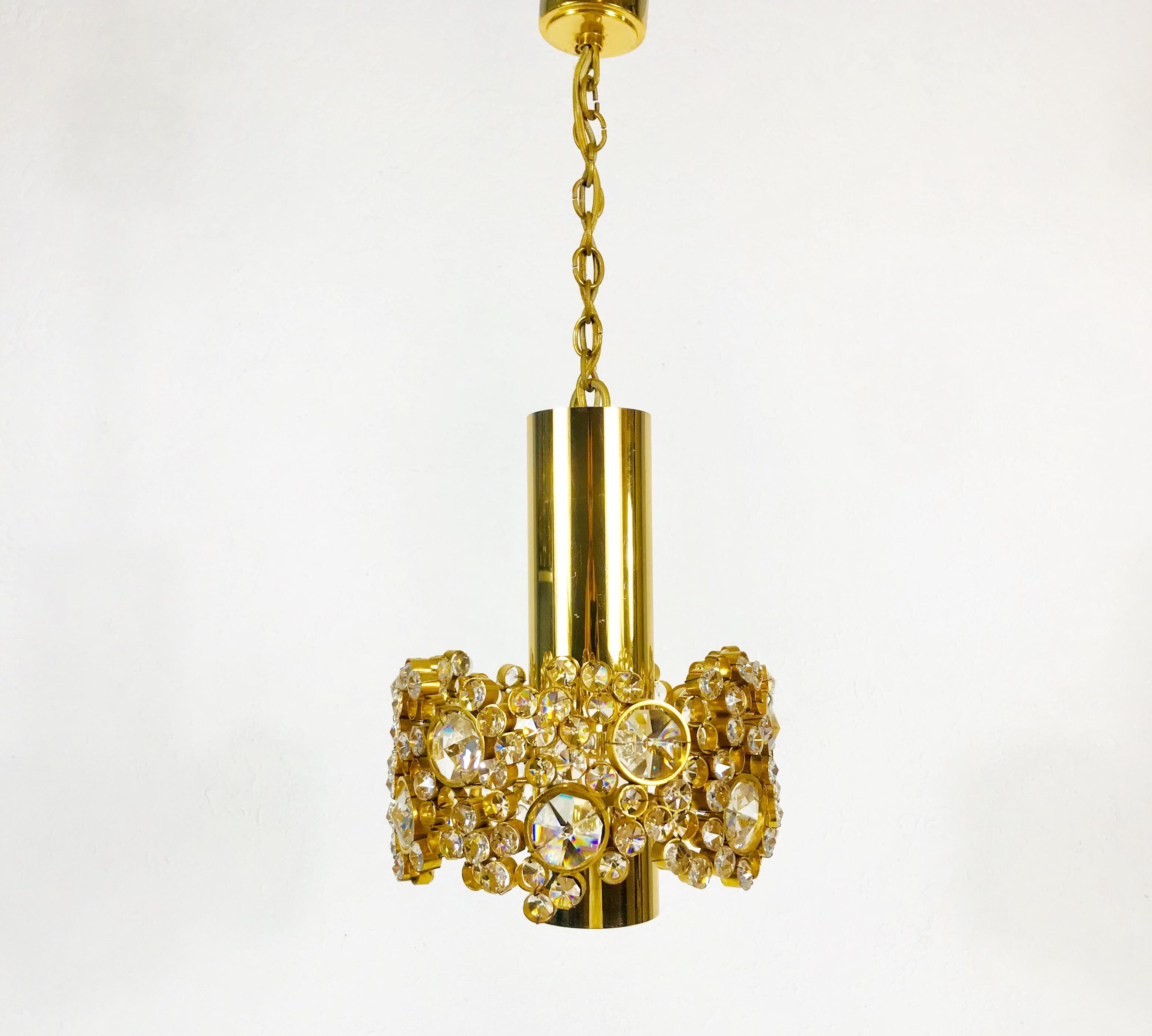 Hollywood Regency Gilt Brass and Crystal Glass Chandelier by Palwa, Germany, 1970s For Sale