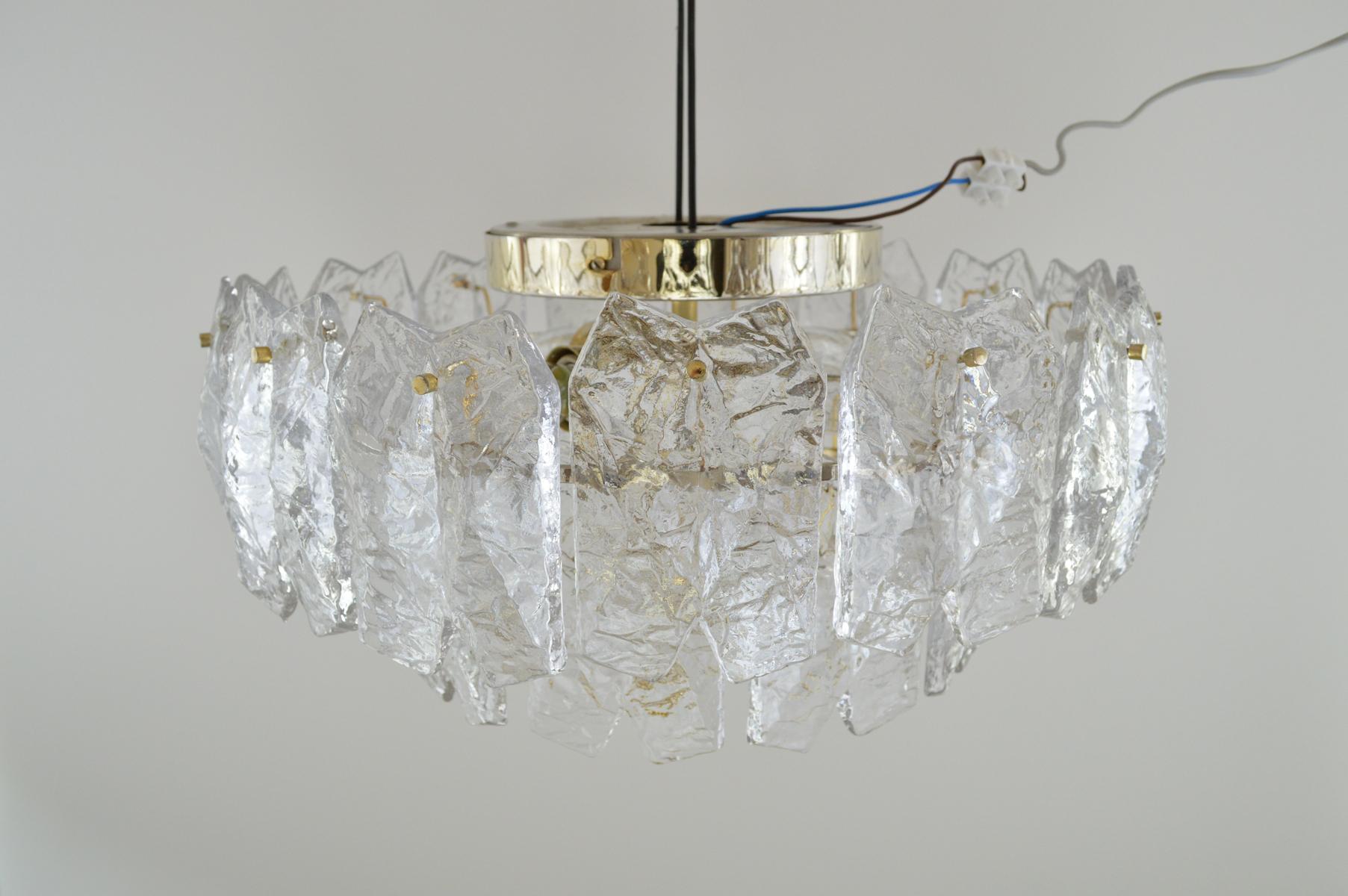 A gilt brass and ice glass brutalist palazzo flush lighting fixture by Julius Kalmar, Vienna, circa 1970.

25 ice glass cut faceted crystals in a two tier configuration.

Presented in very good condition commensurate of age. All glass is in
