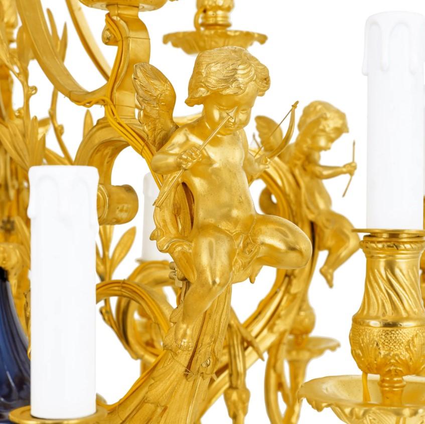 Dorato Lampadario in ottone dorato con cherubini in vendita