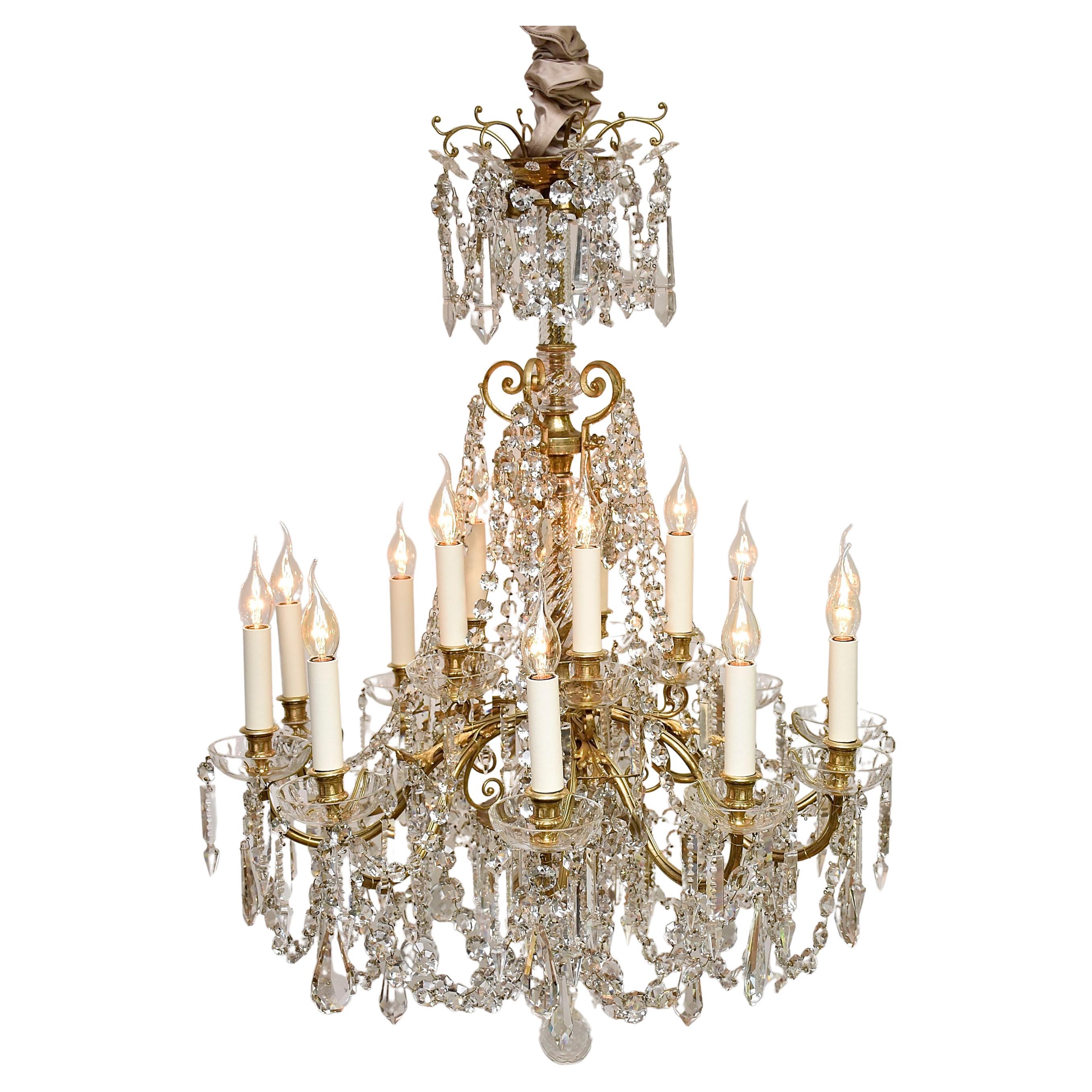 Gilt bronze and Baccarat crystals French chandelier in the style of Louis XVI